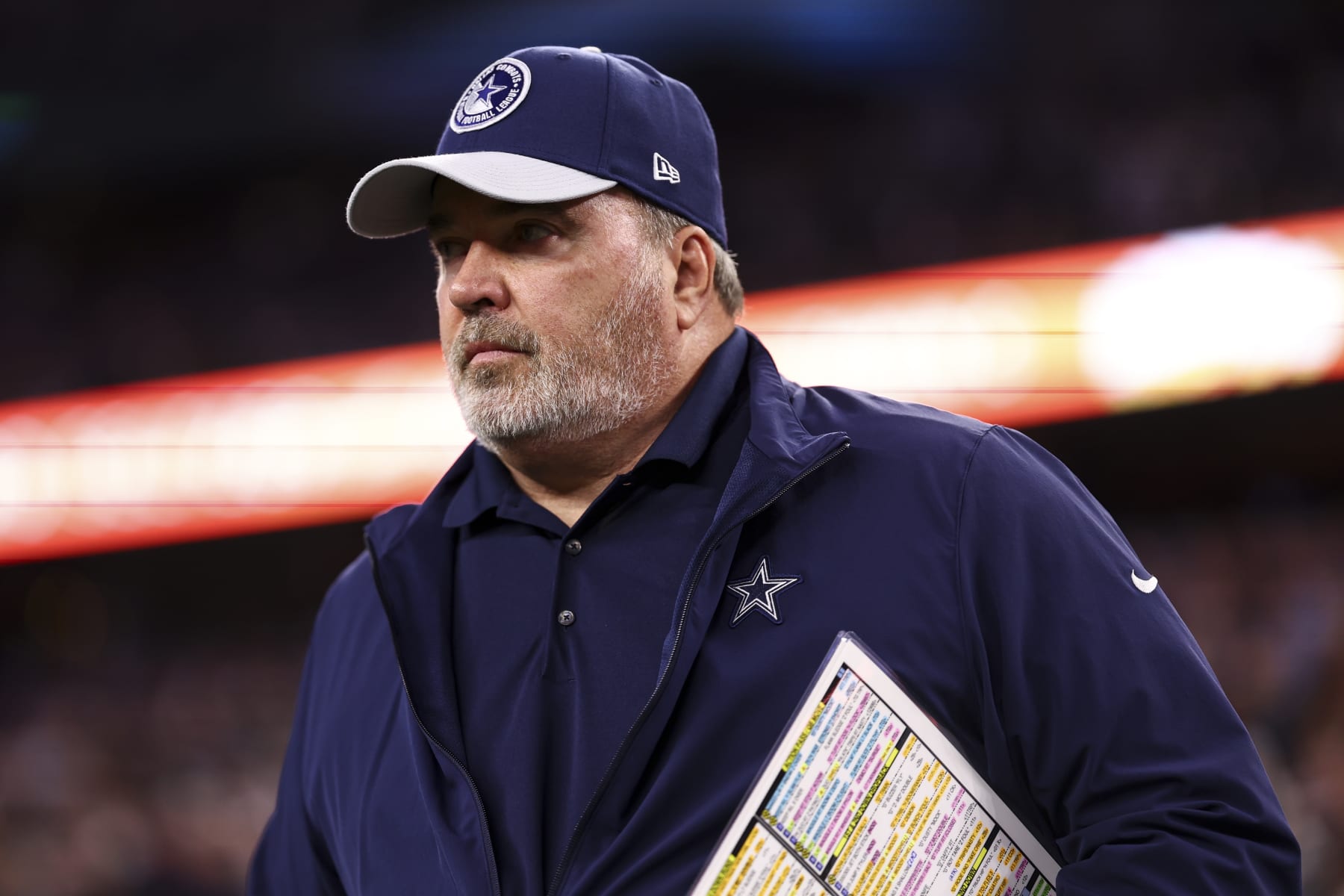 ARLINGTON, TX - DECEMBER 10: Head coach Mike McCarthy of the Dallas Cowboys stands on the sidelines during the national anthem before action against the Philadelphia Eagles at AT&T Stadium on December 10, 2023 in Arlington, Texas. (Photo by Kevin Sabitus/Getty Images)