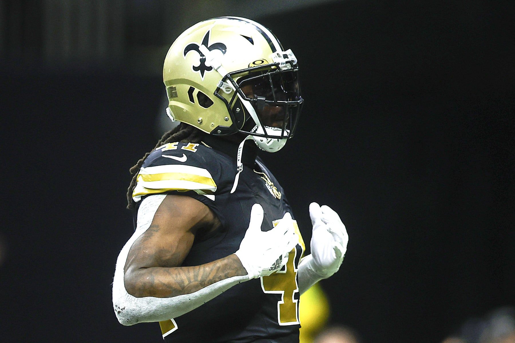 NEW ORLEANS, LOUISIANA - DECEMBER 10: Alvin Kamara #41 of the New Orleans Saints reacts after a touchdown during the second quarter against the Carolina Panthers at Caesars Superdome on December 10, 2023 in New Orleans, Louisiana. (Photo by Chris Graythen/Getty Images)