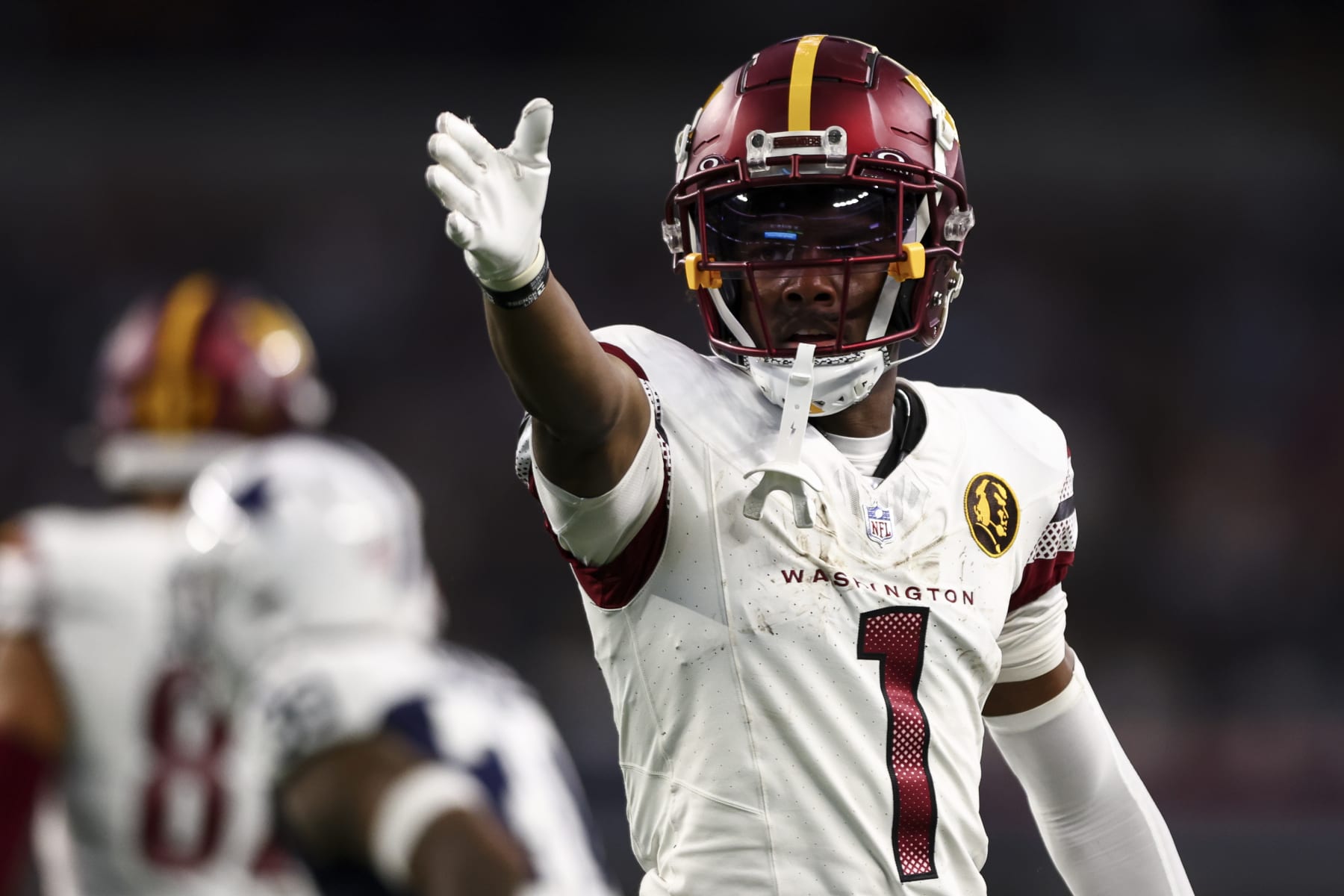 ARLINGTON, TX - NOVEMBER 23: Jahan Dotson #1 of the Washington Commanders celebrates after a play during an NFL football game against the Dallas Cowboys at AT&T Stadium on November 23, 2023 in Arlington, Texas. (Photo by Kevin Sabitus/Getty Images)
