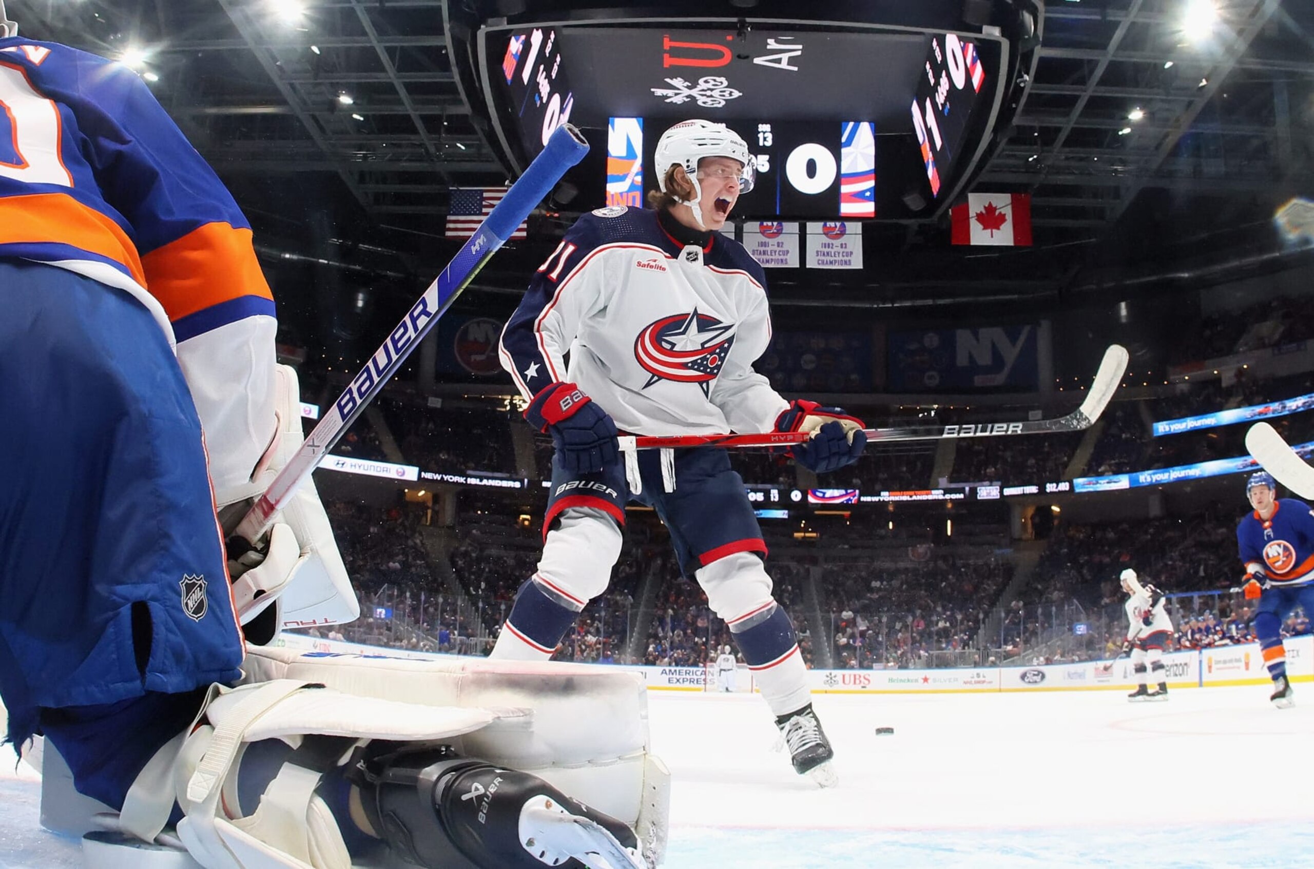 ELMONT, NEW YORK - DECEMBER 07: Adam Fantilli #11 of the Columbus Blue Jackets skates against the New York Islanders at UBS Arena on December 07, 2023 in Elmont, New York. (Photo by Bruce Bennett/Getty Images)