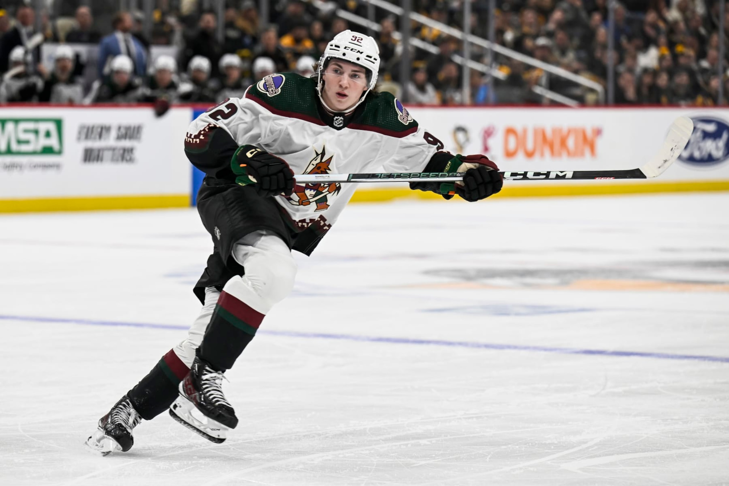 PITTSBURGH, PA - DECEMBER 12: Arizona Coyotes Center Logan Cooley (92) skates during the third period in the NHL game between the Pittsburgh Penguins and the Arizona Coyotes on December 12, 2023, at PPG Paints Arena in Pittsburgh, PA. (Photo by Jeanine Leech/Icon Sportswire via Getty Images)