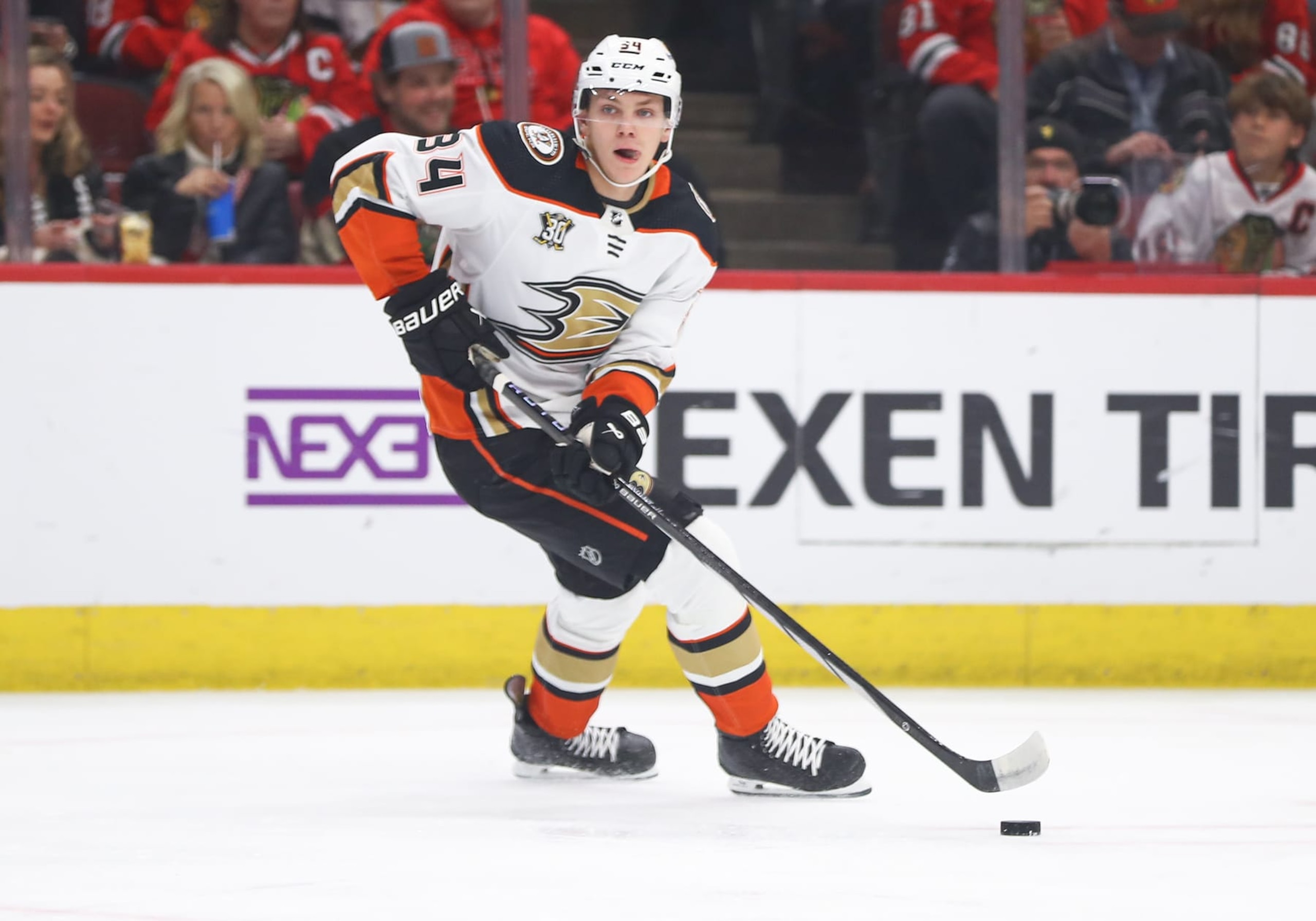 CHICAGO, IL - DECEMBER 07: Pavel Mintyukov #34 of the Anaheim Ducks controls the puck during the first period against the Chicago Blackhawks at the United Center on December 7, 2023 in Chicago, Illinois. (Photo by Melissa Tamez/Icon Sportswire via Getty Images)