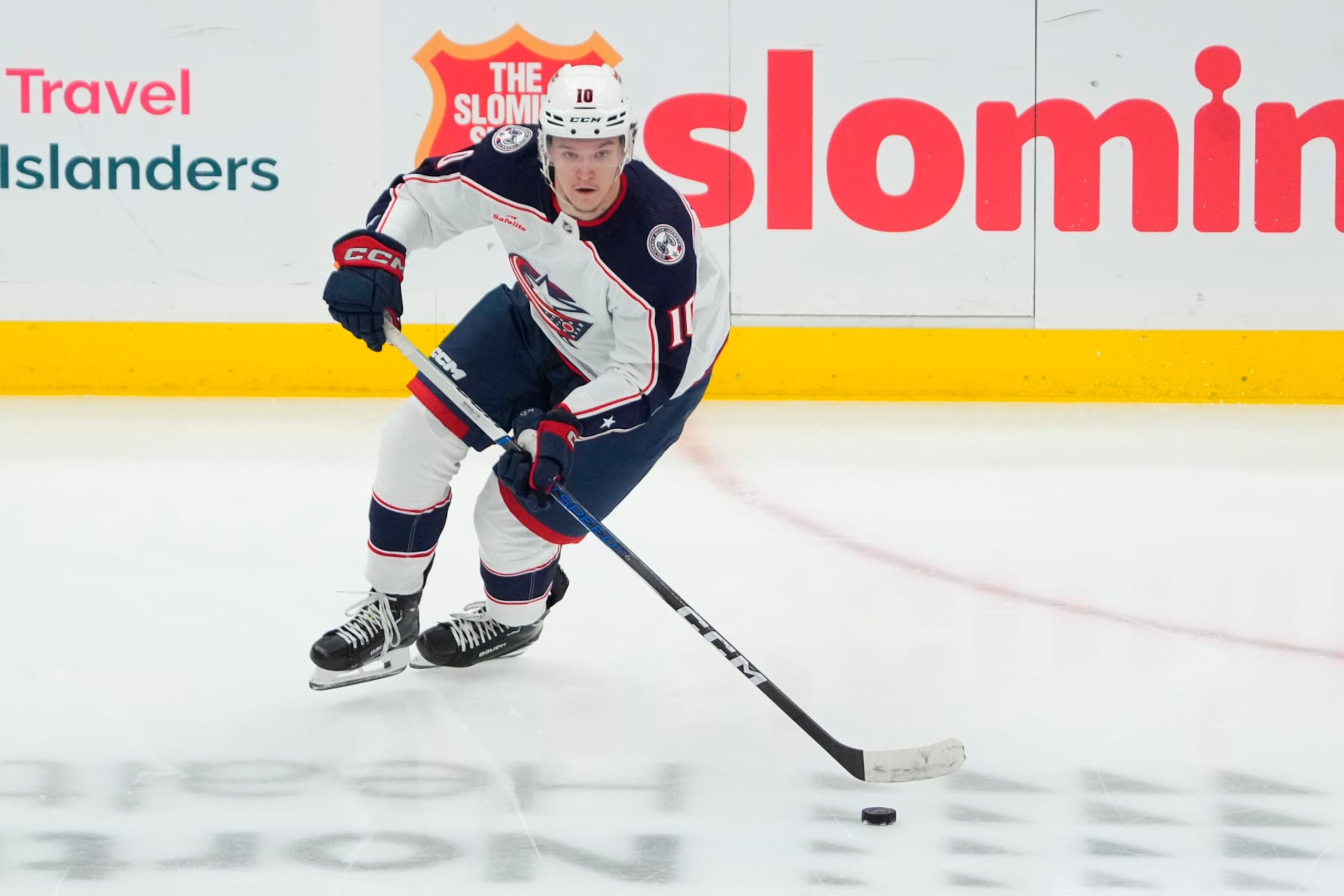 ELMONT, NY - DECEMBER 07: Columbus Blue Jackets Left Wing Dmitri Voronkov (10) skates with the puck during the second period of the National Hockey League game between the Columbus Blue Jackets and the New York Islanders on December 7, 2023, at UBS Arena in Elmont, NY. (Photo by Gregory Fisher/Icon Sportswire via Getty Images)