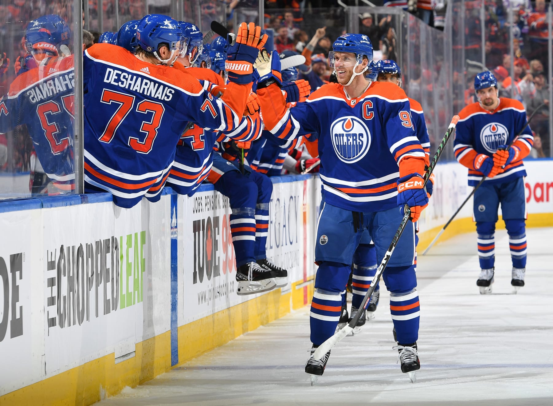 EDMONTON, CANADA - DECEMBER 10: Connor McDavid #97 of the Edmonton Oilers celebrates his third period goal against the New Jersey Devils with his teammates at the bench at Rogers Place on December 10, 2023, in Edmonton, Alberta, Canada. (Photo by Andy Devlin/NHLI via Getty Images)