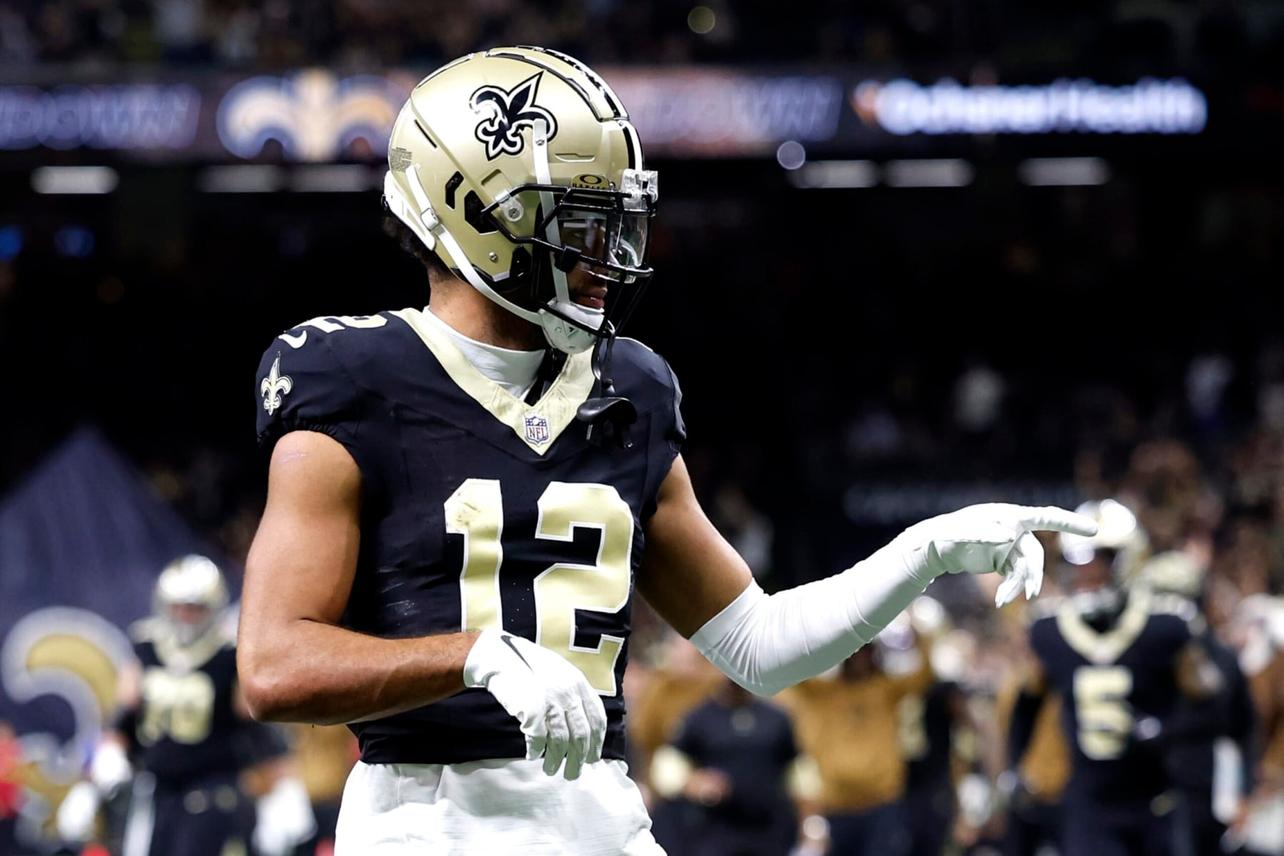 NEW ORLEANS, LOUISIANA - NOVEMBER 05: Chris Olave #12 of the New Orleans Saints celebrates after a touchdown during the first quarter in the game against the Chicago Bears at Caesars Superdome on November 05, 2023 in New Orleans, Louisiana. (Photo by Wesley Hitt/Getty Images)
