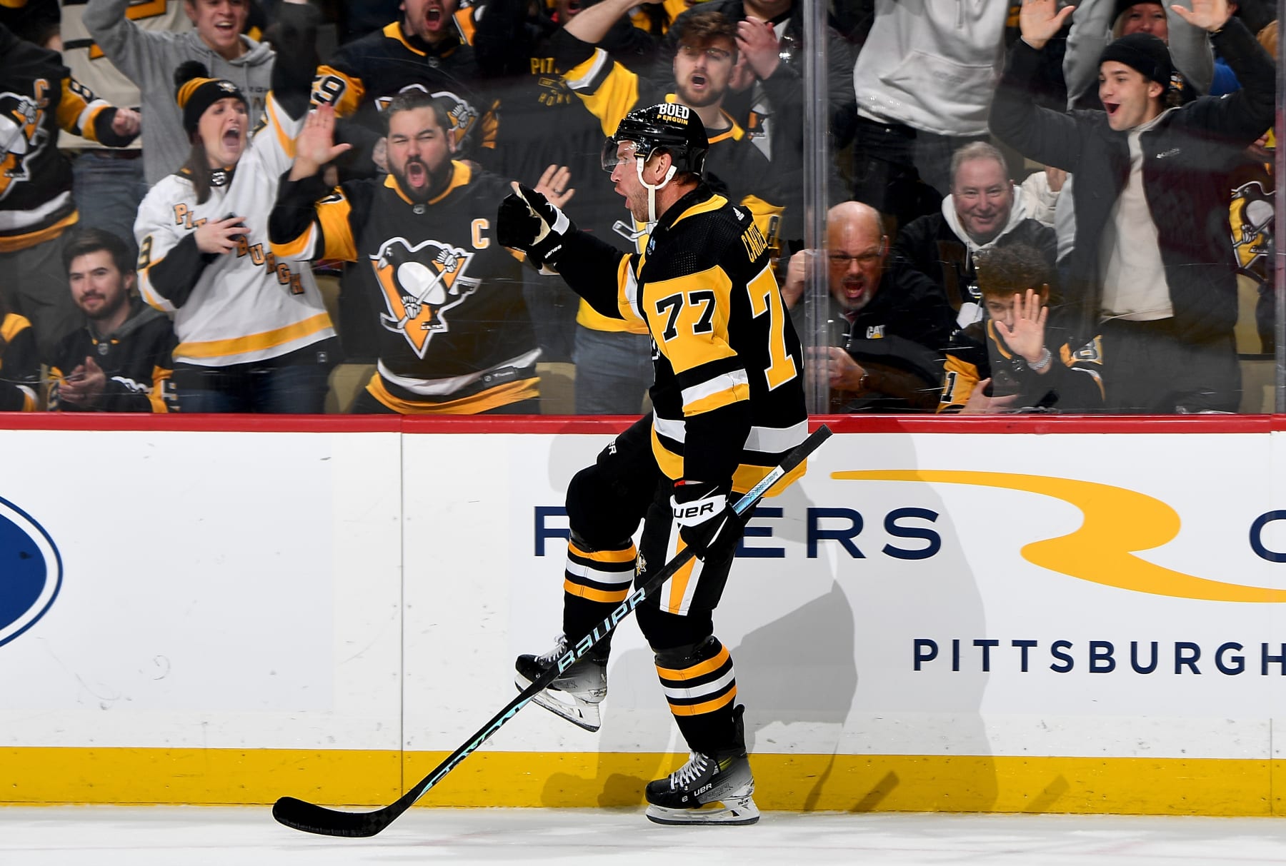 PITTSBURGH, PA - DECEMBER 12:  Jeff Carter #77 of the Pittsburgh Penguins celebrates after scoring in the first period against the Arizona Coyotes at PPG PAINTS Arena on December 12, 2023 in Pittsburgh, Pennsylvania. (Photo by Joe Sargent/NHLI via Getty Images)