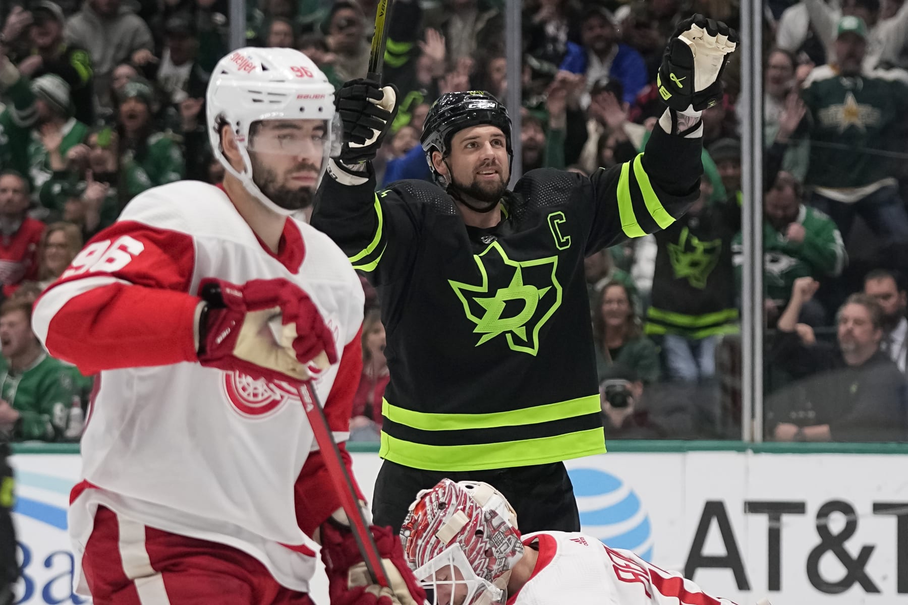 DALLAS, TEXAS - DECEMBER 11: Jamie Benn #14 of the Dallas Stars celebrates after Joe Pavelski (not pictured) #16 scores a goal during the third period against the Detroit Red Wings at American Airlines Center on December 11, 2023 in Dallas, Texas. (Photo by Sam Hodde/Getty Images)