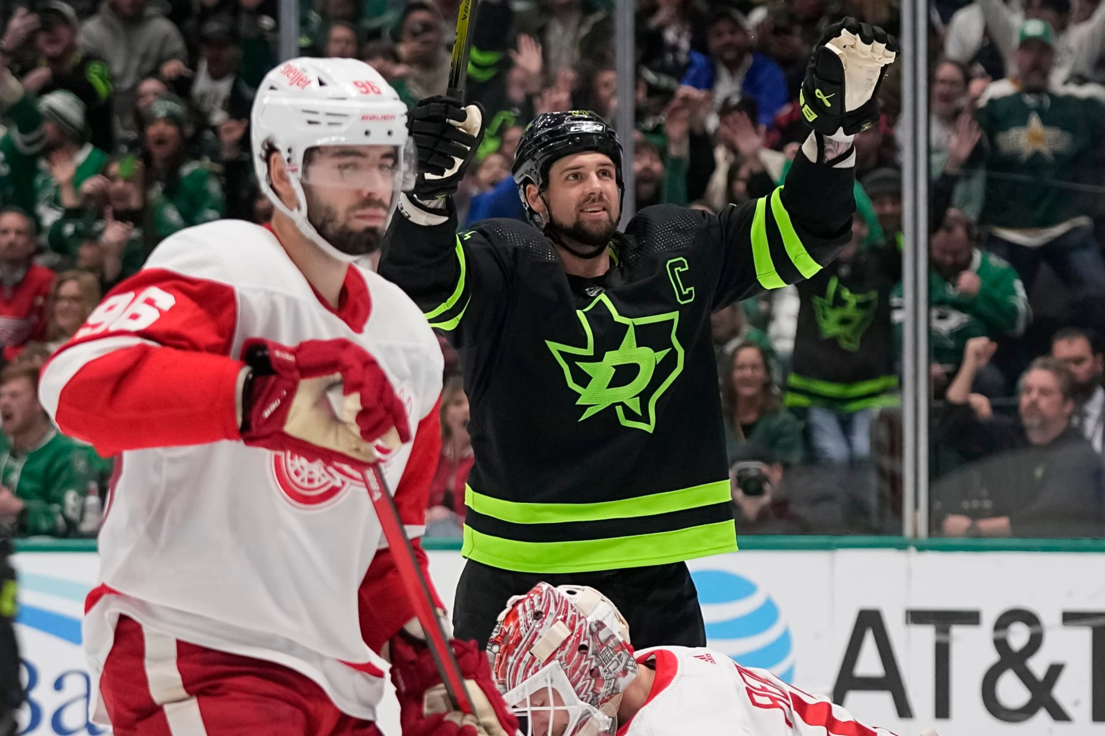 DALLAS, TEXAS - DECEMBER 11: Jamie Benn #14 of the Dallas Stars celebrates after Joe Pavelski (not pictured) #16 scores a goal during the third period against the Detroit Red Wings at American Airlines Center on December 11, 2023 in Dallas, Texas. (Photo by Sam Hodde/Getty Images) DALLAS, TEXAS - DECEMBER 11: Jamie Benn #14 of the Dallas Stars celebrates after Joe Pavelski (not pictured) #16 scores a goal during the third period against the Detroit Red Wings at American Airlines Center on December 11, 2023 in Dallas, Texas. (Photo by Sam Hodde/Getty Images)