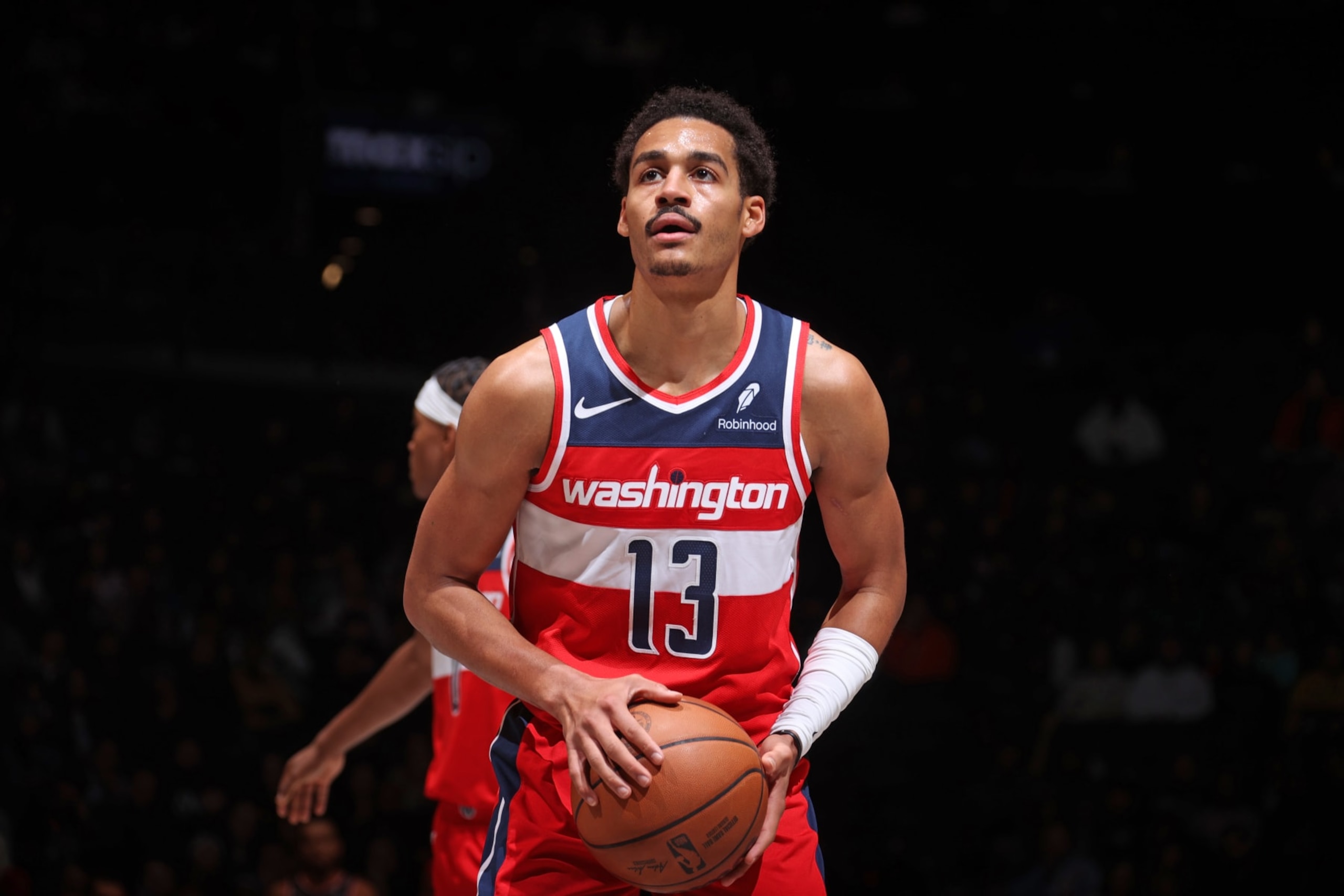 BROOKLYN, NY - DECEMBER 8: Jordan Poole #13 of the Washington Wizards shoots a free throw during the game against the Brooklyn Nets on December 8, 2023 at Barclays Center in Brooklyn, New York. NOTE TO USER: User expressly acknowledges and agrees that, by downloading and or using this Photograph, user is consenting to the terms and conditions of the Getty Images License Agreement. Mandatory Copyright Notice: Copyright 2023 NBAE (Photo by Nathaniel S. Butler/NBAE via Getty Images)