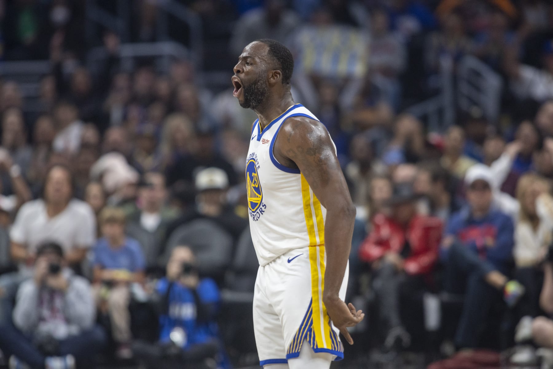 LOS ANGELES, CA - DECEMBER 02: Golden State Warriors forward Draymond Green (23) reacts to making a basket in the first half of an NBA basketball game between the Golden State Warriors and Los Angeles Clippers, Saturday, December 2, 2023, at Crypto.com Arena in Los Angeles, California. (Photo by Tony Ding/Icon Sportswire via Getty Images)