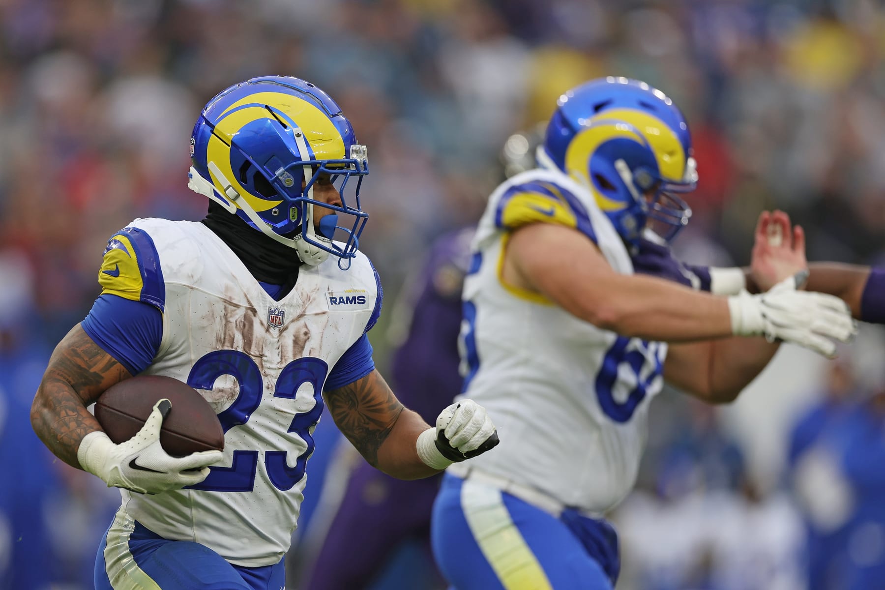 BALTIMORE, MARYLAND - DECEMBER 10: Kyren Williams #23 of the Los Angeles Rams runs the ball during the first quarter in the game against Baltimore Ravens at M&T Bank Stadium on December 10, 2023 in Baltimore, Maryland. (Photo by Todd Olszewski/Getty Images)