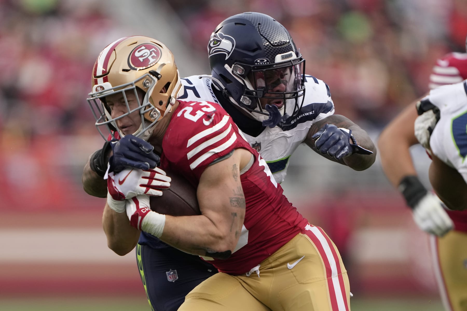 SANTA CLARA, CALIFORNIA - DECEMBER 10: Christian McCaffrey #23 of the San Francisco 49ers runs the ball during the third quarter in the game against the Seattle Seahawks at Levi's Stadium on December 10, 2023 in Santa Clara, California. (Photo by Thearon W. Henderson/Getty Images)