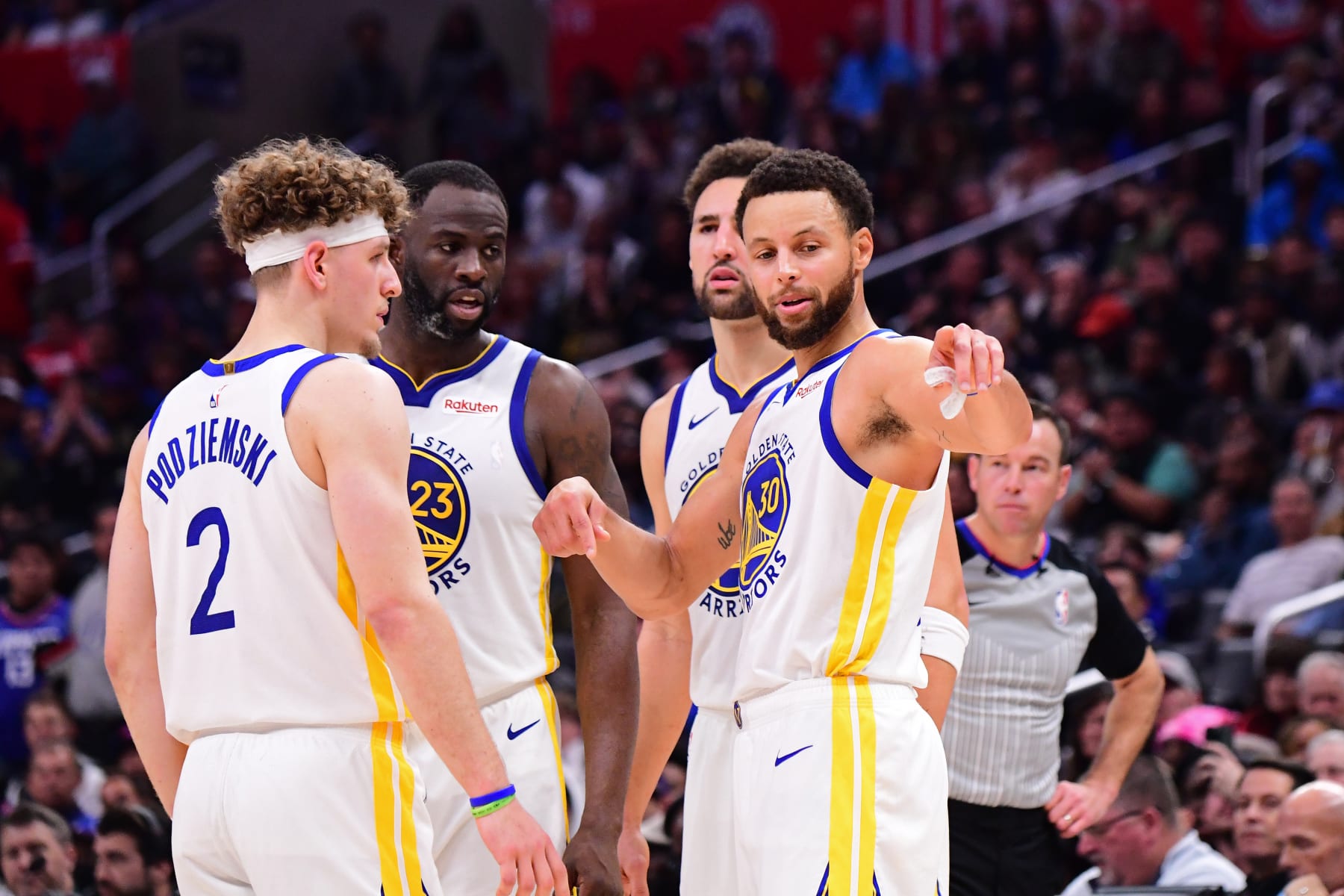 Brandin Podziemski, Draymond Green, Klay Thompson and Stephen Curry