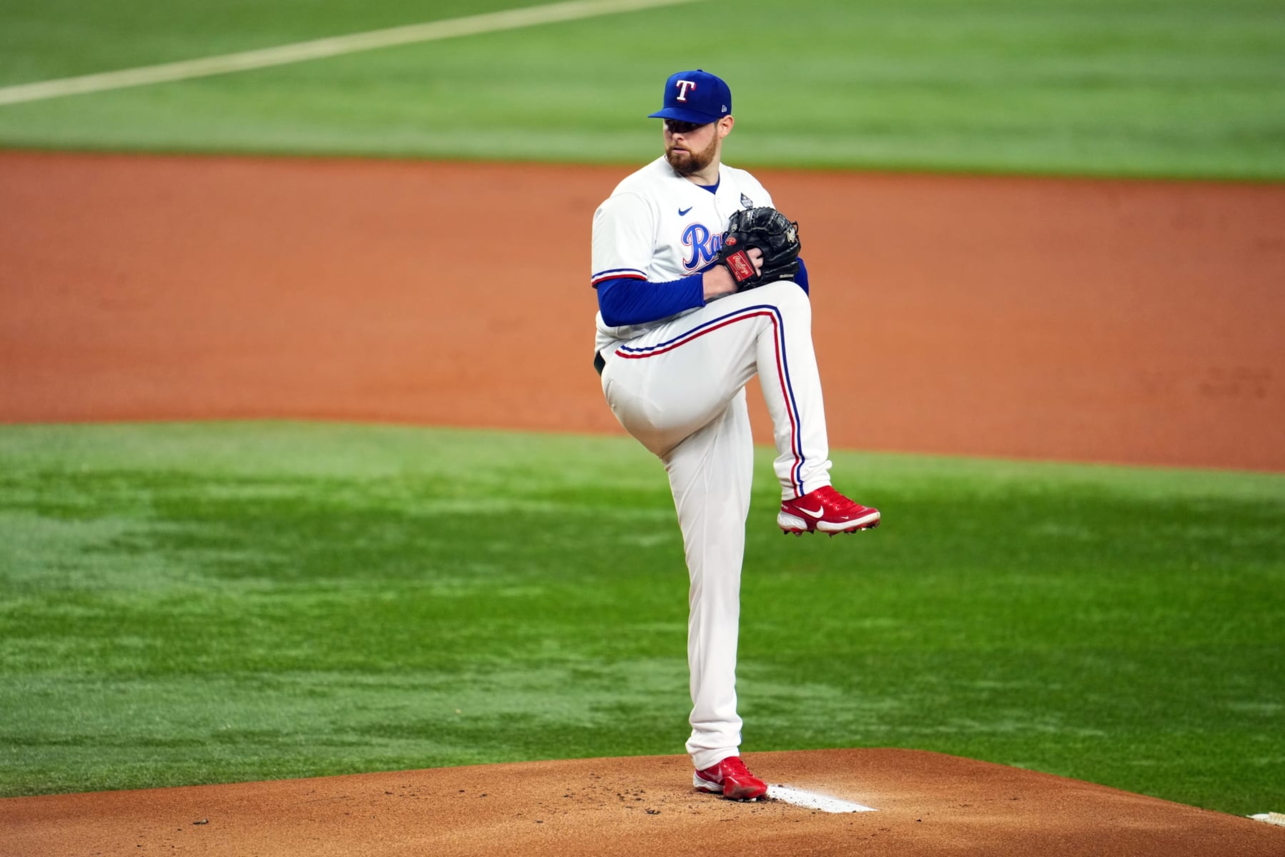 ARLINGTON, TX - OCTOBER 28: Jordan Montgomery #52 of the Texas Rangers pitches in the first inning during Game 2 of the 2023 World Series between the Arizona Diamondbacks and the Texas Rangers at Globe Life Field on Saturday, October 28, 2023 in Arlington, Texas. (Photo by Cooper Neill/MLB Photos via Getty Images)
