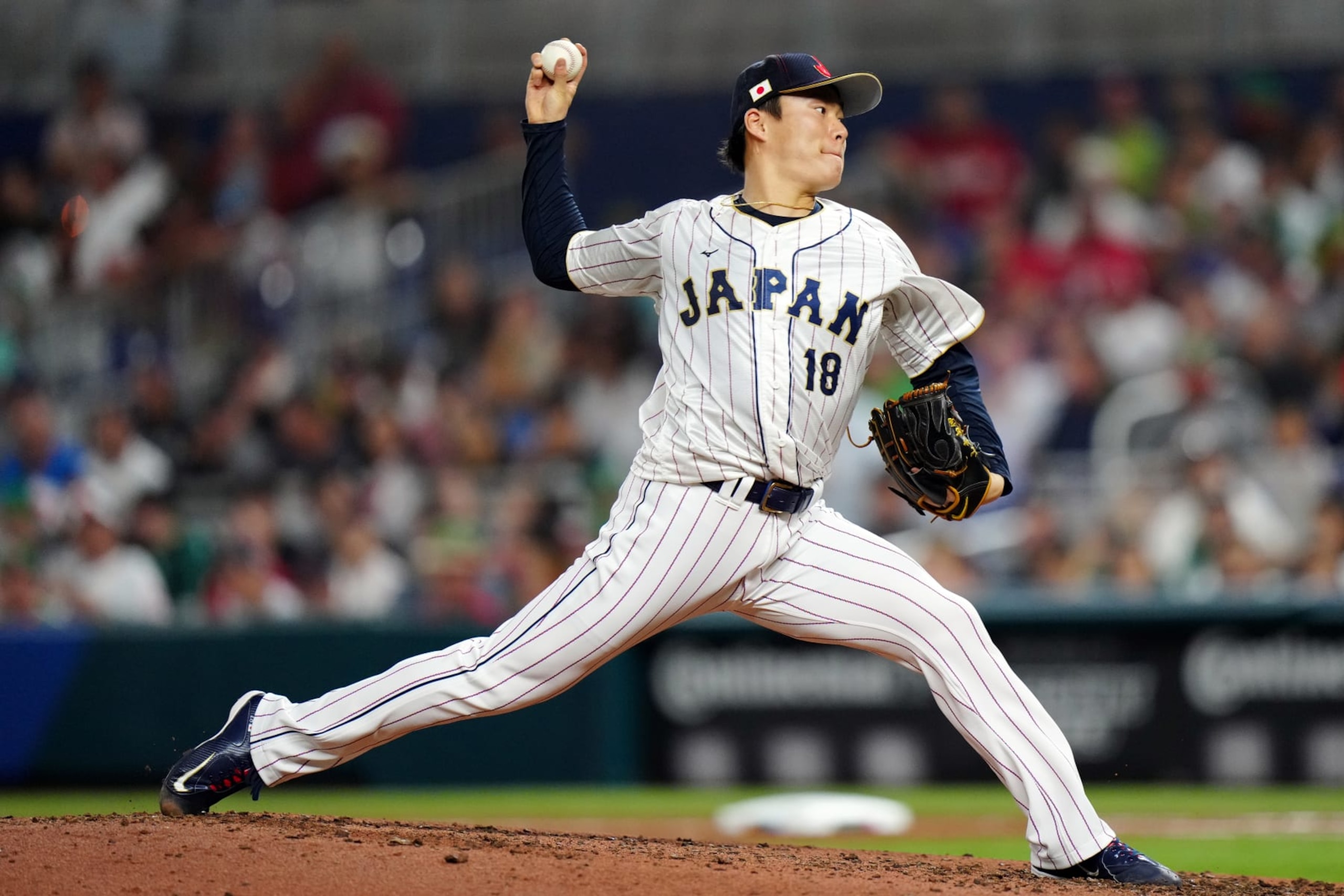 MIAMI, FL - MARCH 20:  Yoshinobu Yamamoto #18 of Team Japan pitches during the 2023 World Baseball Classic Semifinal game between Team Mexico and Team Japan at loanDepot Park on Monday, March 20, 2023 in Miami, Florida. (Photo by Daniel Shirey/WBCI/MLB Photos via Getty Images)