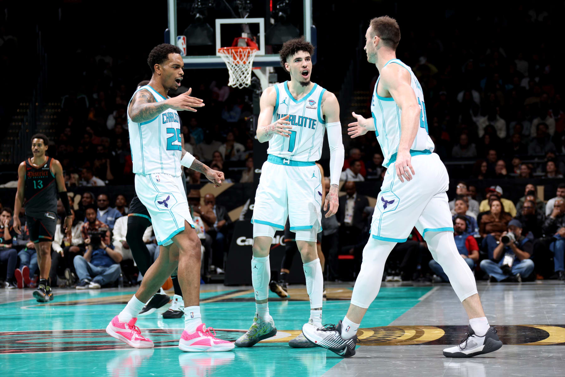 P.J. Washington, LaMelo Ball and Gordon Hayward