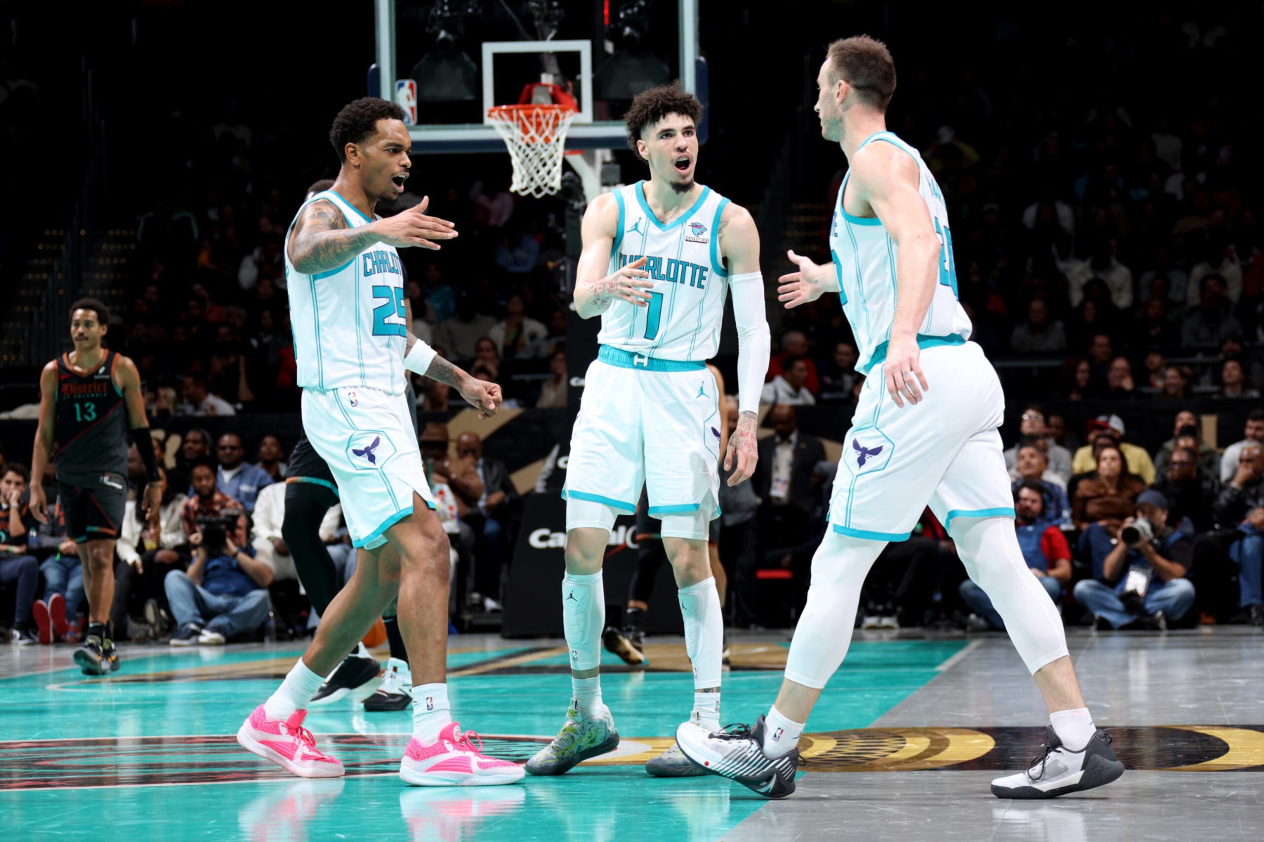 P.J. Washington, LaMelo Ball and Gordon Hayward