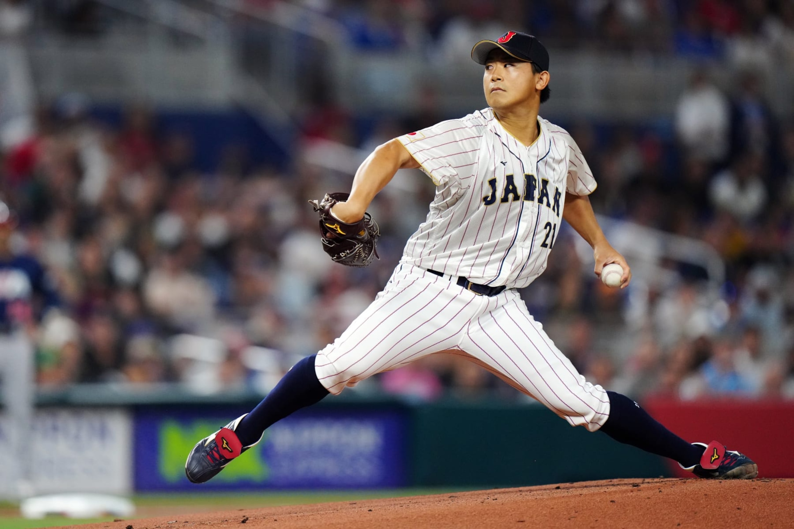 MIAMI, FL - MARCH 21:  Shota Imanaga #21 of Team Japan pitches in the first inning during the 2023 World Baseball Classic Championship game between Team USA and Team Japan at loanDepot Park on Tuesday, March 21, 2023 in Miami, Florida. (Photo by Daniel Shirey/WBCI/MLB Photos via Getty Images)