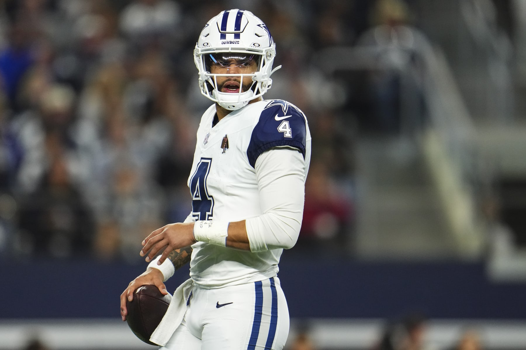 ARLINGTON, TX - DECEMBER 10: Dak Prescott #4 of the Dallas Cowboys looks on from the field during an NFL football game against the Philadelphia Eagles at AT&T Stadium on December 10, 2023 in Arlington, Texas. (Photo by Cooper Neill/Getty Images)