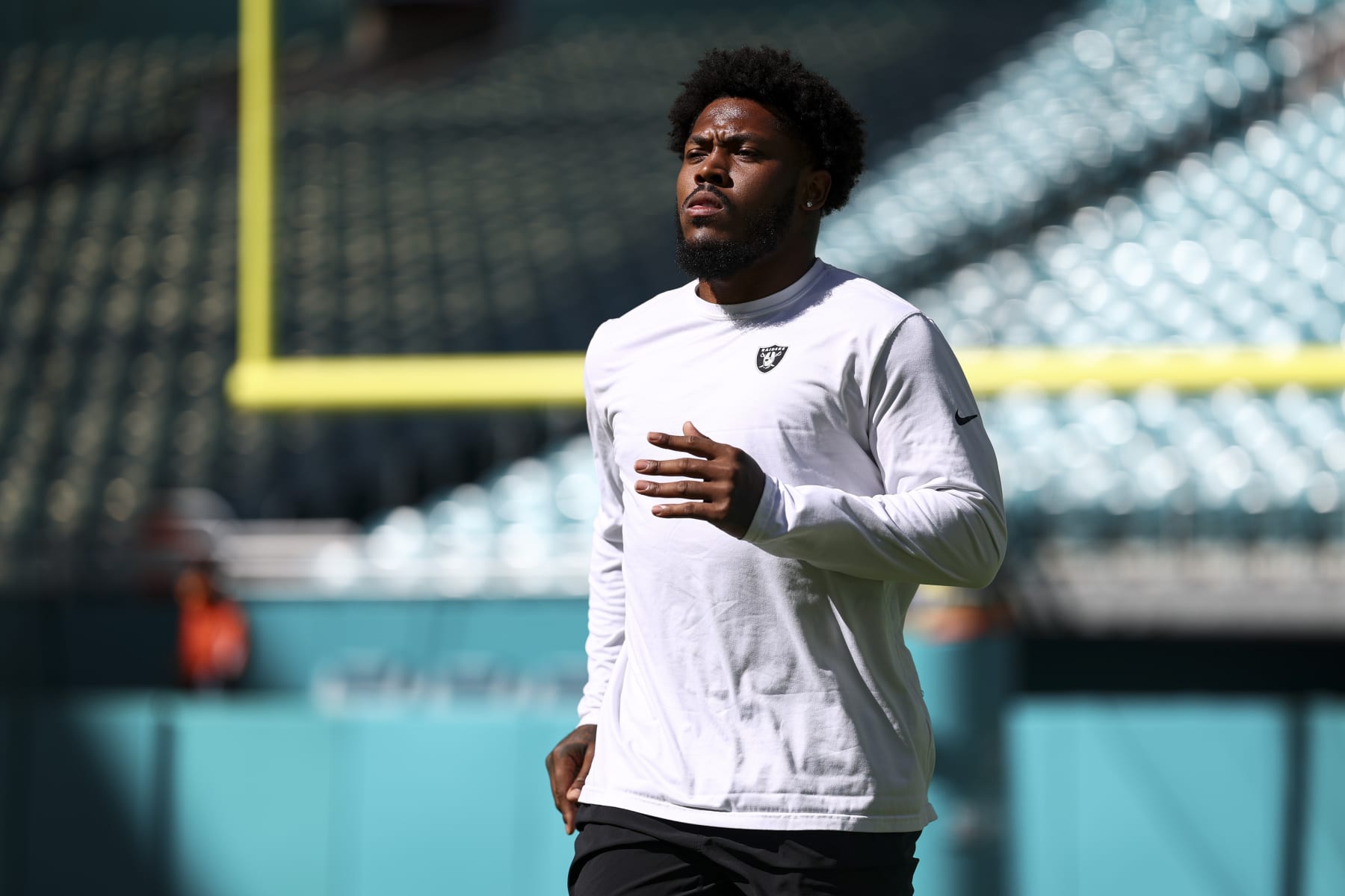 MIAMI GARDENS, FL - NOVEMBER 19: Josh Jacobs #8 of the Las Vegas Raiders warms up prior to an NFL football game against the Miami Dolphins at Hard Rock Stadium on November 19, 2023 in Miami Gardens, Florida. (Photo by Kevin Sabitus/Getty Images)