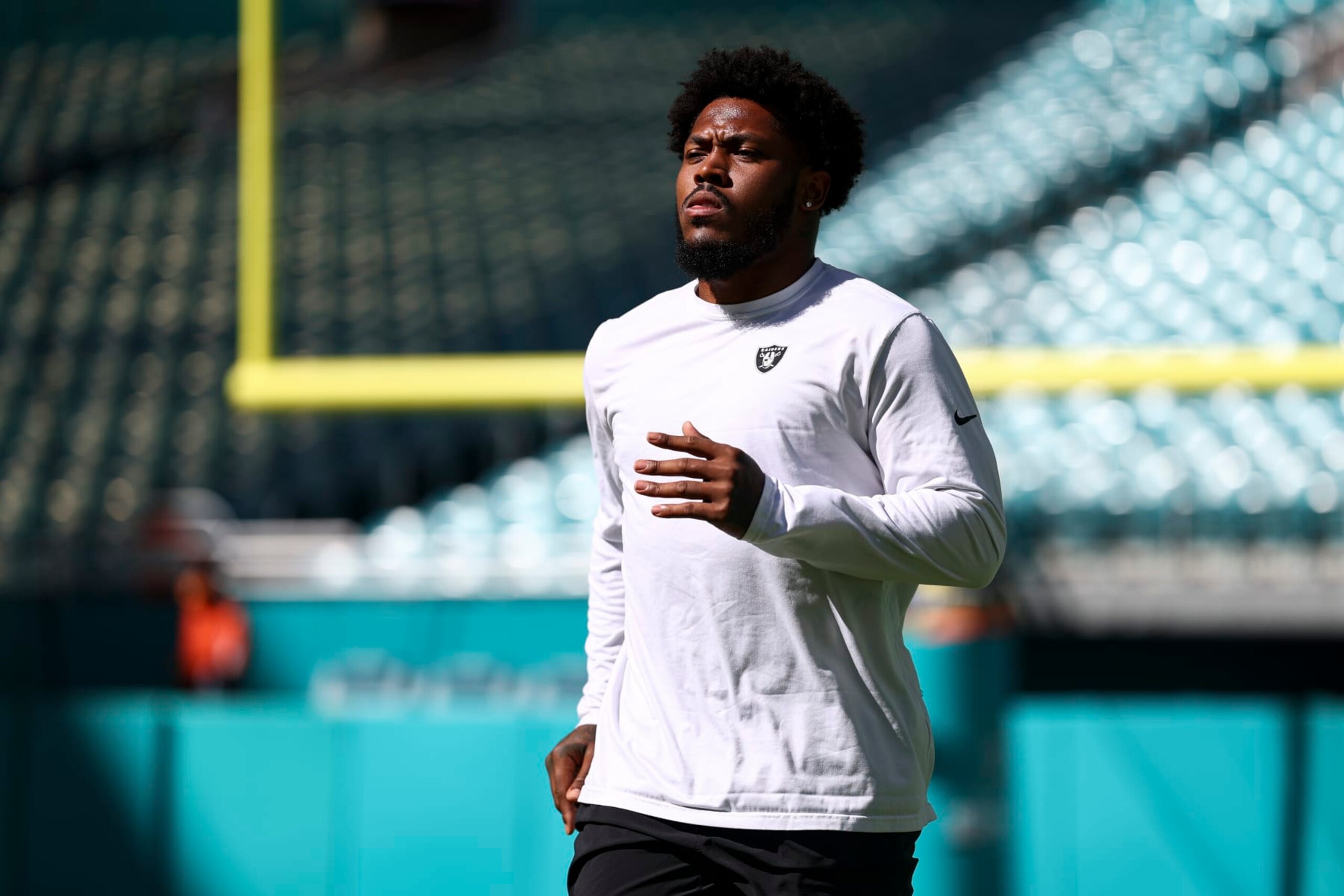 MIAMI GARDENS, FL - NOVEMBER 19: Josh Jacobs #8 of the Las Vegas Raiders warms up prior to an NFL football game against the Miami Dolphins at Hard Rock Stadium on November 19, 2023 in Miami Gardens, Florida. (Photo by Kevin Sabitus/Getty Images)