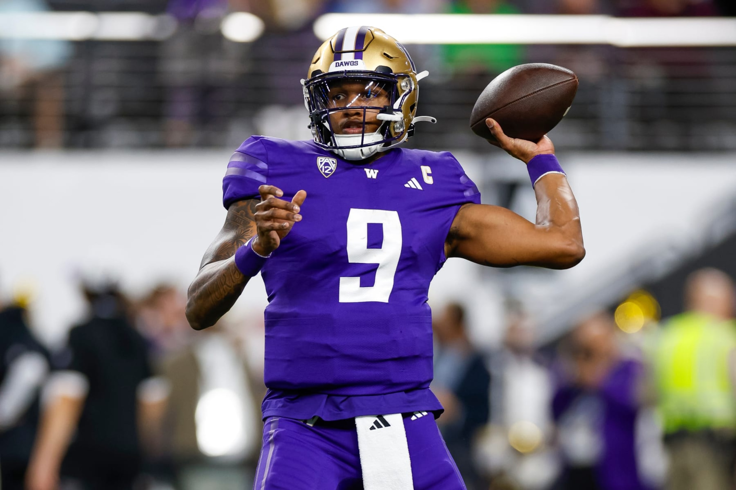 LAS VEGAS, NEVADA - DECEMBER 1: Michael Penix Jr. #9 of the Washington Huskies warms up prior to the Pac-12 Championship game against the Oregon Ducks at Allegiant Stadium on December 1, 2023 in Las Vegas, Nevada. (Photo by Brandon Sloter/Image Of Sport/Getty Images)