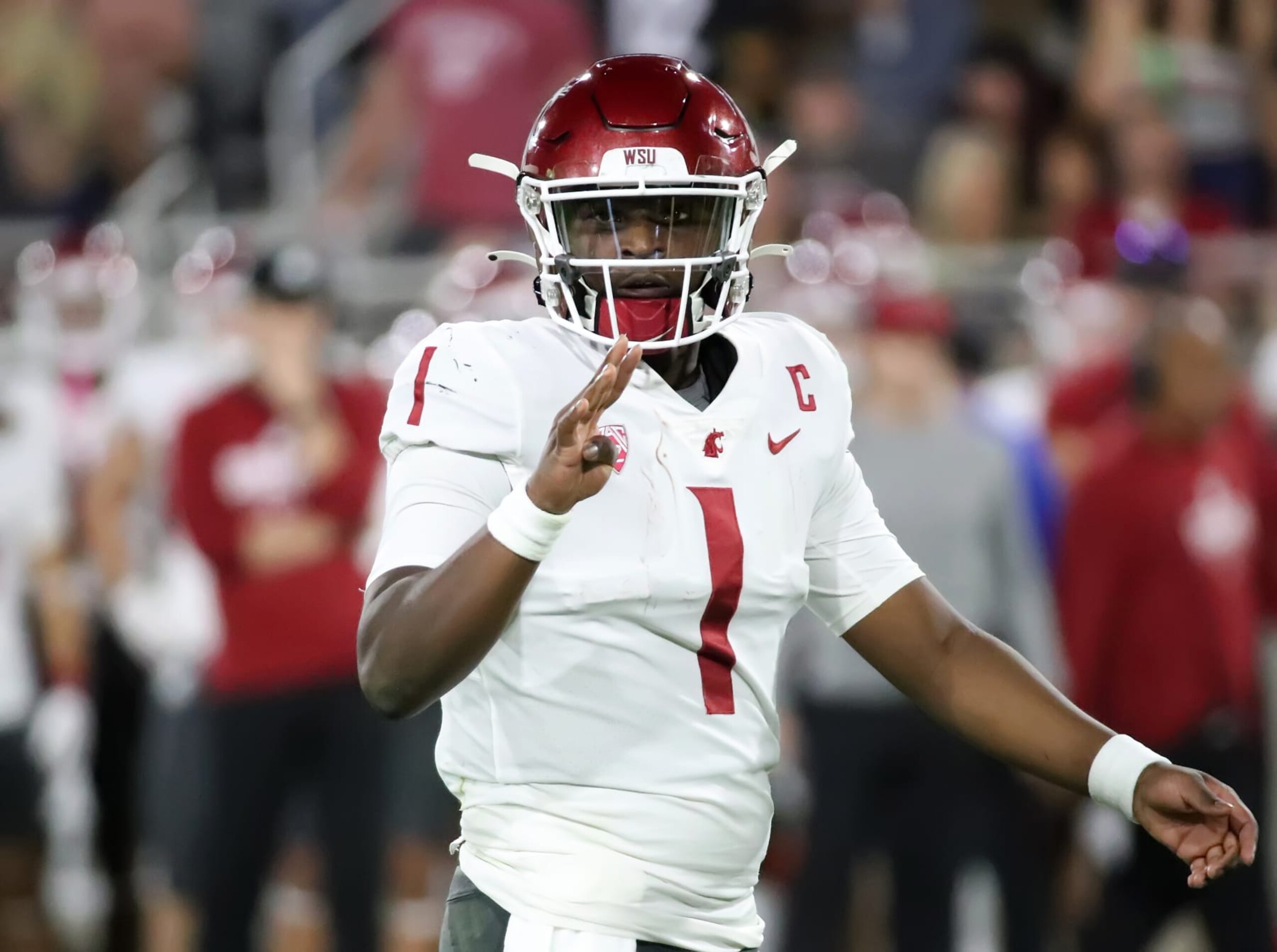 TEMPE, ARIZONA - OCTOBER 28: Cameron Ward #1 of the Washington State Cougars looks to receivers to confirm the play called in the first quarter against the Arizona State Sun Devils at Mountain America Stadium on October 28, 2023 in Tempe, Arizona. (Photo by Bruce Yeung/Getty Images) TEMPE, ARIZONA - OCTOBER 28: Cameron Ward #1 of the Washington State Cougars looks to receivers to confirm the play called in the first quarter against the Arizona State Sun Devils at Mountain America Stadium on October 28, 2023 in Tempe, Arizona. (Photo by Bruce Yeung/Getty Images)