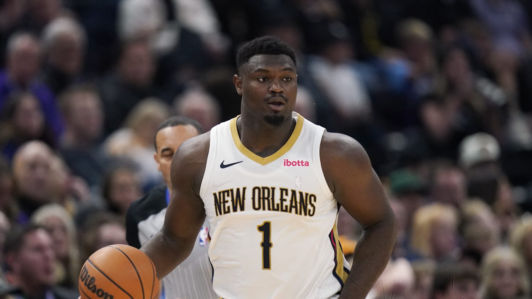 New Orleans Pelicans forward Zion Williamson (1) brings the ball up court during the second half of an NBA basketball game against the Utah Jazz Monday, Nov. 27, 2023, in Salt Lake City. (AP Photo/Rick Bowmer)