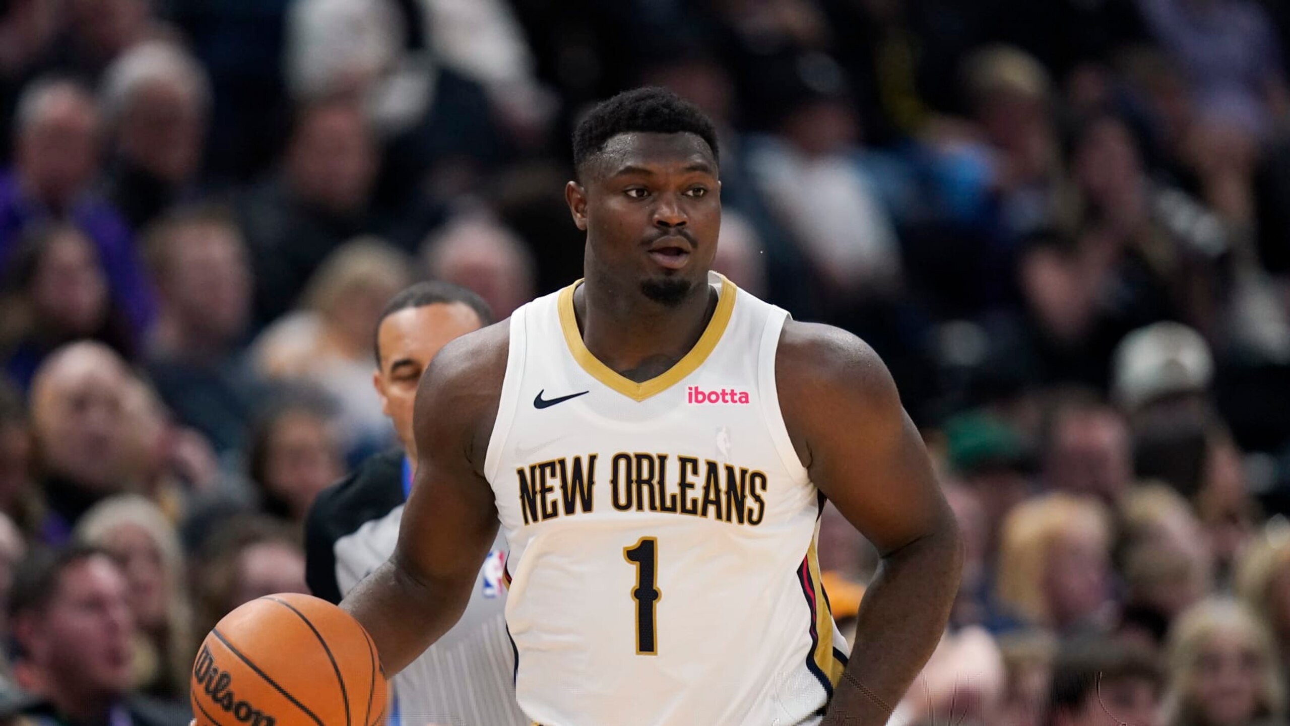 New Orleans Pelicans forward Zion Williamson (1) brings the ball up court during the second half of an NBA basketball game against the Utah Jazz Monday, Nov. 27, 2023, in Salt Lake City. (AP Photo/Rick Bowmer)