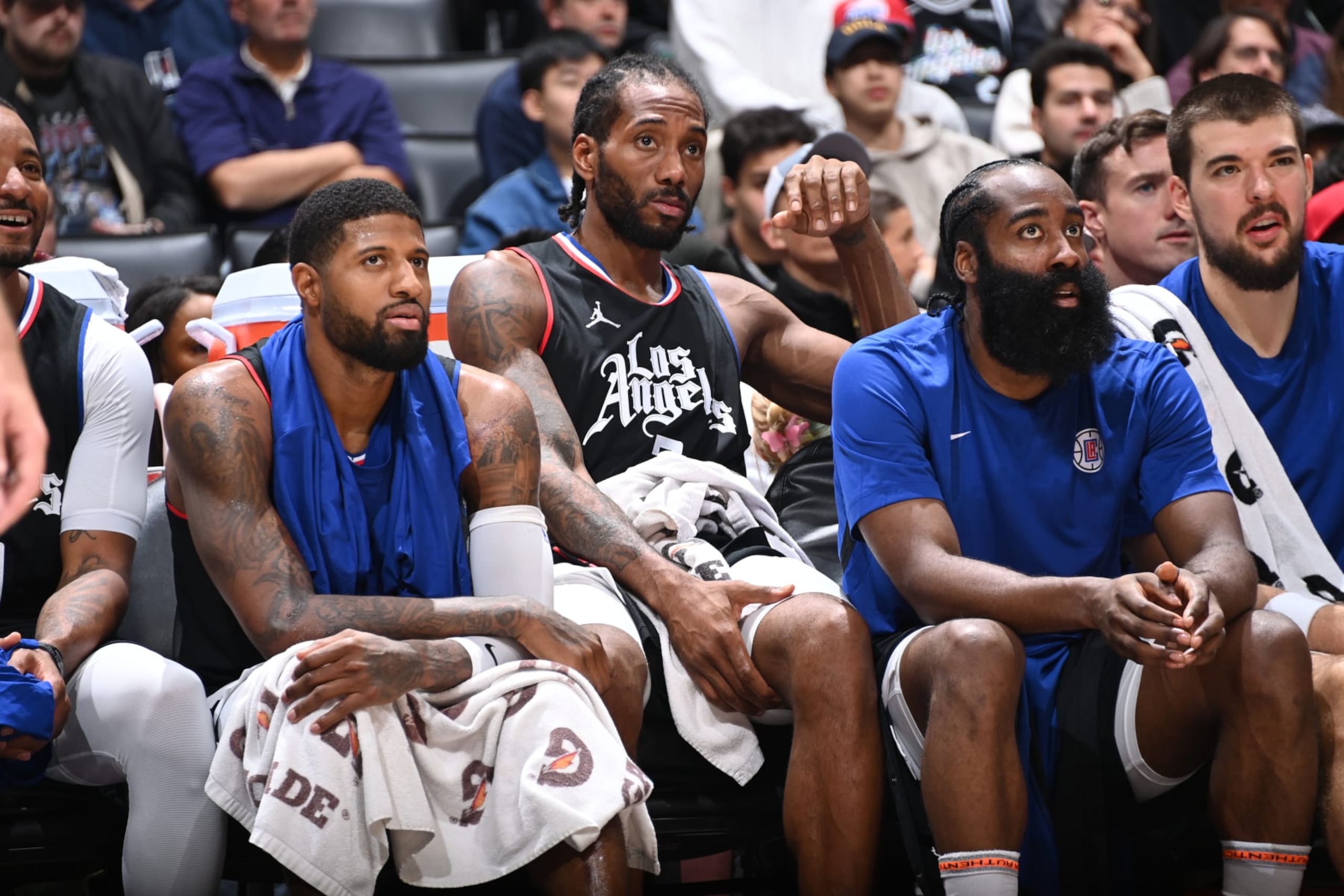 LOS ANGELES, CA - NOVEMBER 25: Paul George #13 of the LA Clippers, Kawhi Leonard #2 of the LA Clippers and James Harden #1 of the LA Clippers look on during the game against the Dallas Mavericks on November 25, 2023 at Crypto.Com Arena in Los Angeles, California. NOTE TO USER: User expressly acknowledges and agrees that, by downloading and/or using this Photograph, user is consenting to the terms and conditions of the Getty Images License Agreement. Mandatory Copyright Notice: Copyright 2023 NBAE (Photo by Andrew D. Bernstein/NBAE via Getty Images)