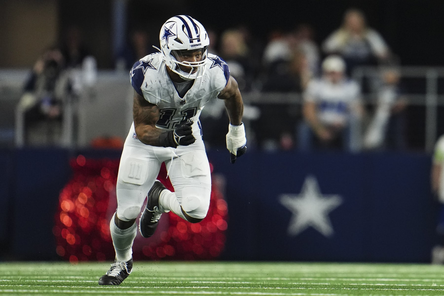 ARLINGTON, TX - DECEMBER 10: Micah Parsons #11 of the Dallas Cowboys rushes the passer during an NFL football game against the Philadelphia Eagles at AT&T Stadium on December 10, 2023 in Arlington, Texas. (Photo by Cooper Neill/Getty Images)