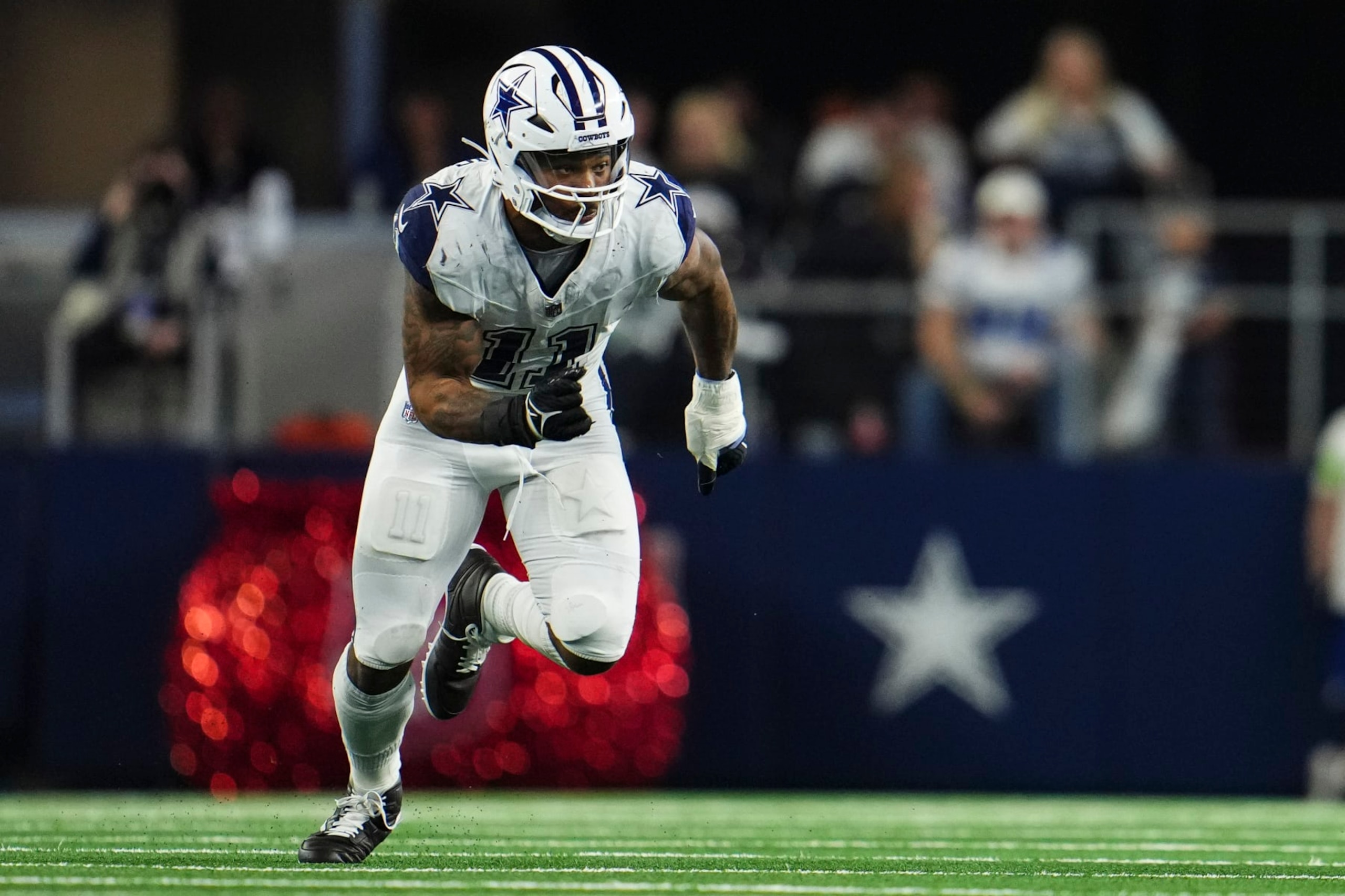 ARLINGTON, TX - DECEMBER 10: Micah Parsons #11 of the Dallas Cowboys rushes the passer during an NFL football game against the Philadelphia Eagles at AT&T Stadium on December 10, 2023 in Arlington, Texas. (Photo by Cooper Neill/Getty Images)