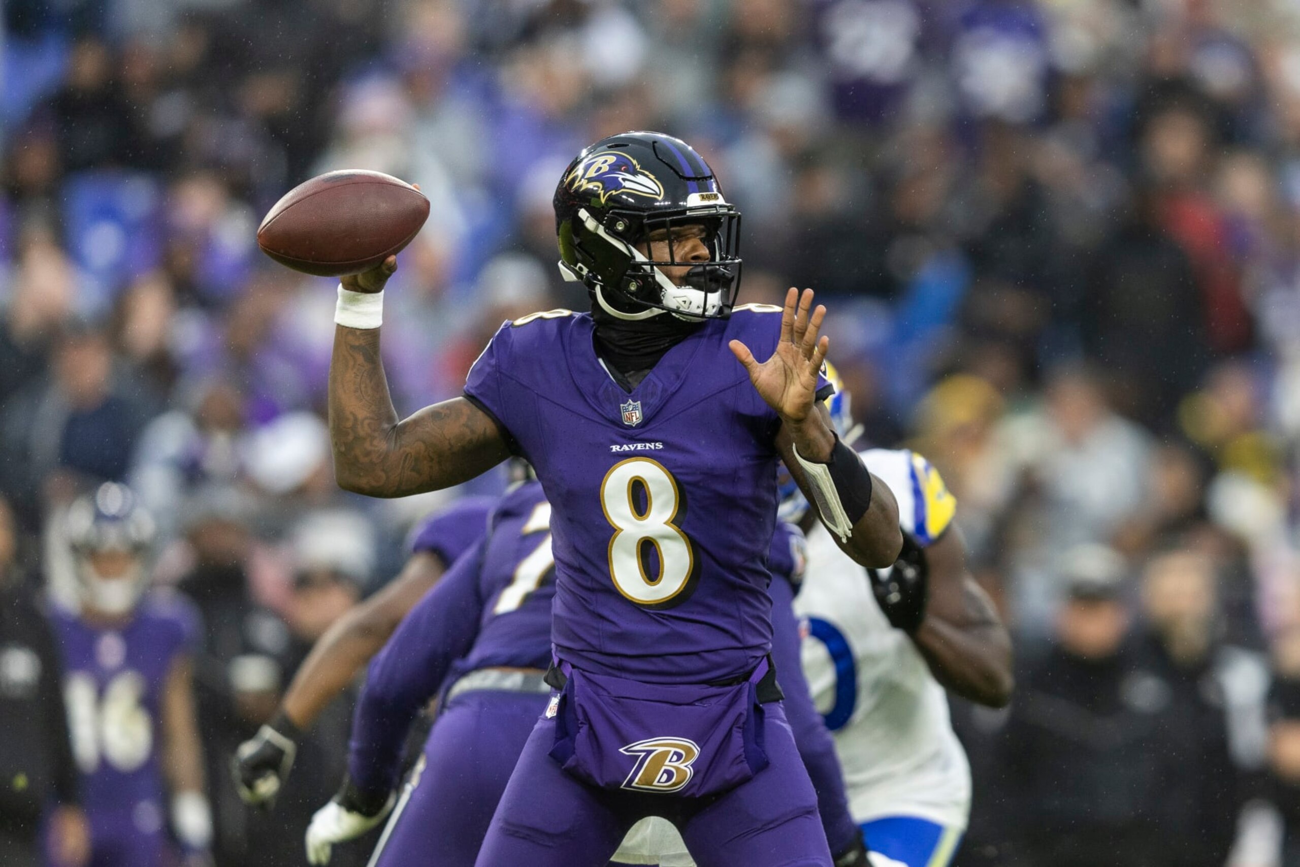 BALTIMORE, MARYLAND - DECEMBER 10: Lamar Jackson #8 of the Baltimore Ravens throws a pass during an NFL football game between the Baltimore Ravens and the Los Angeles Rams at M&T Bank Stadium on December 10, 2023 in Baltimore, Maryland. (Photo by Michael Owens/Getty Images) BALTIMORE, MARYLAND - DECEMBER 10: Lamar Jackson #8 of the Baltimore Ravens throws a pass during an NFL football game between the Baltimore Ravens and the Los Angeles Rams at M&T Bank Stadium on December 10, 2023 in Baltimore, Maryland. (Photo by Michael Owens/Getty Images)