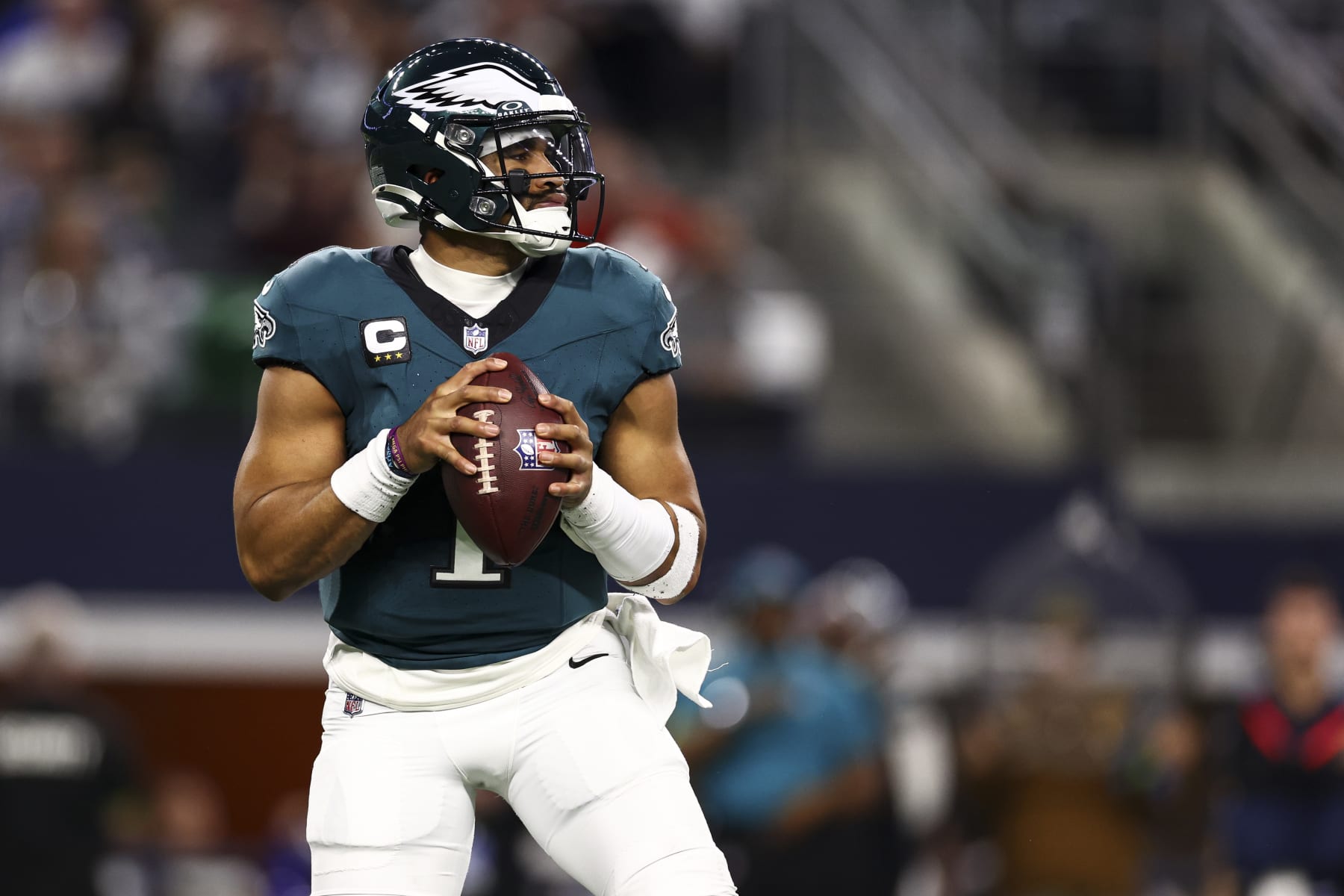 ARLINGTON, TX - DECEMBER 10: Jalen Hurts #1 of the Philadelphia Eagles drops back to pass during the first quarter against the Dallas Cowboys at AT&T Stadium on December 10, 2023 in Arlington, Texas. (Photo by Kevin Sabitus/Getty Images)