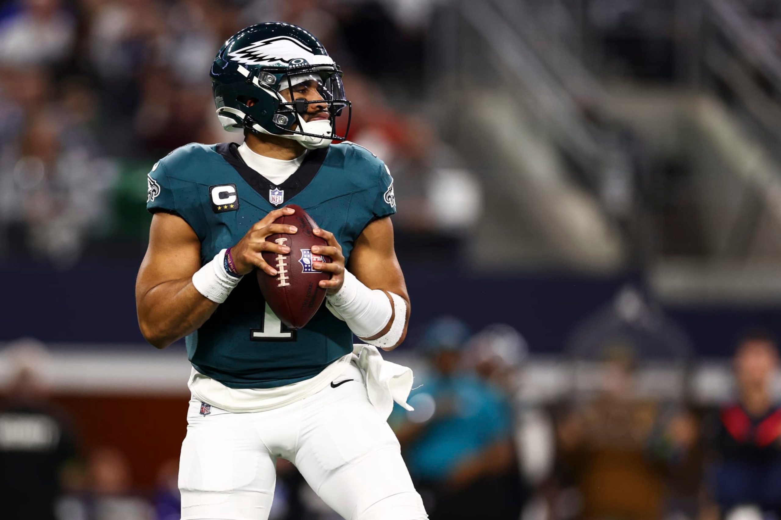 ARLINGTON, TX - DECEMBER 10: Jalen Hurts #1 of the Philadelphia Eagles drops back to pass during the first quarter against the Dallas Cowboys at AT&T Stadium on December 10, 2023 in Arlington, Texas. (Photo by Kevin Sabitus/Getty Images) ARLINGTON, TX - DECEMBER 10: Jalen Hurts #1 of the Philadelphia Eagles drops back to pass during the first quarter against the Dallas Cowboys at AT&T Stadium on December 10, 2023 in Arlington, Texas. (Photo by Kevin Sabitus/Getty Images)