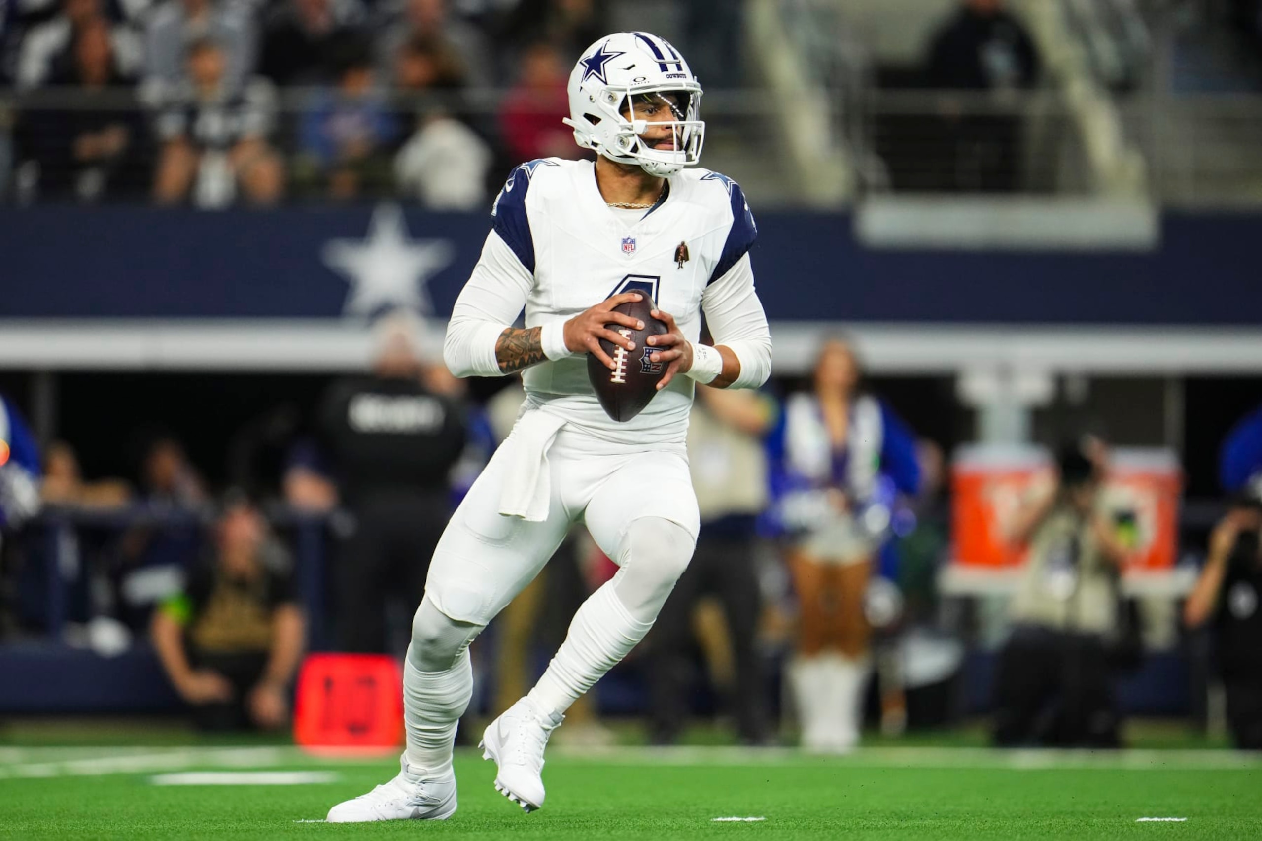 ARLINGTON, TX - DECEMBER 10: Dak Prescott #4 of the Dallas Cowboys drops back to pass during an NFL football game against the Philadelphia Eagles at AT&T Stadium on December 10, 2023 in Arlington, Texas. (Photo by Cooper Neill/Getty Images)