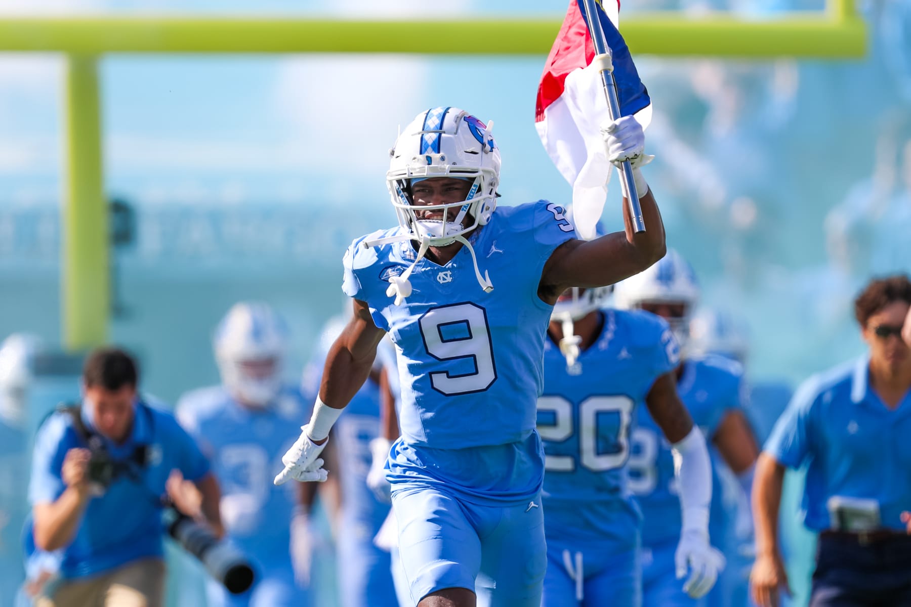 CHAPEL HILL, NC - OCTOBER 07: Devontez Walker #9 of the North Carolina Tar Heels leads his team on to the field before a football game against the Syracuse Orange at Kenan Memorial Stadium in Chapel Hill, North Carolina on Oct 7, 2023. (Photo by David Jensen/Icon Sportswire via Getty Images)