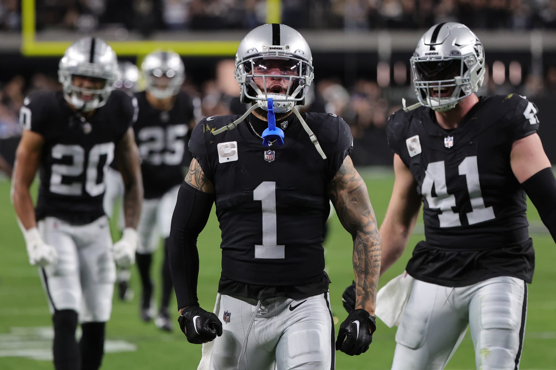 LAS VEGAS, NEVADA - DECEMBER 14: Safety Marcus Epps #1 of the Las Vegas Raiders celebrates a fumble against the Los Angeles Chargers during the first quarter at Allegiant Stadium on December 14, 2023 in Las Vegas, Nevada. (Photo by Ethan Miller/Getty Images)
