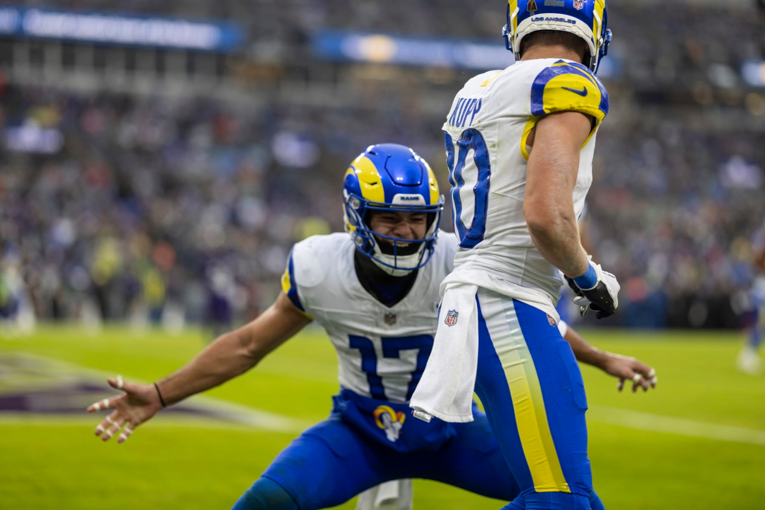 BALTIMORE, MARYLAND - DECEMBER 10: Puka Nacua #17 of the Los Angeles Rams reacts after Cooper Kupp #10 of the Los Angeles Rams scored a touchdown during an NFL football game between the Baltimore Ravens and the Los Angeles Rams at M&T Bank Stadium on December 10, 2023 in Baltimore, Maryland. (Photo by Michael Owens/Getty Images)