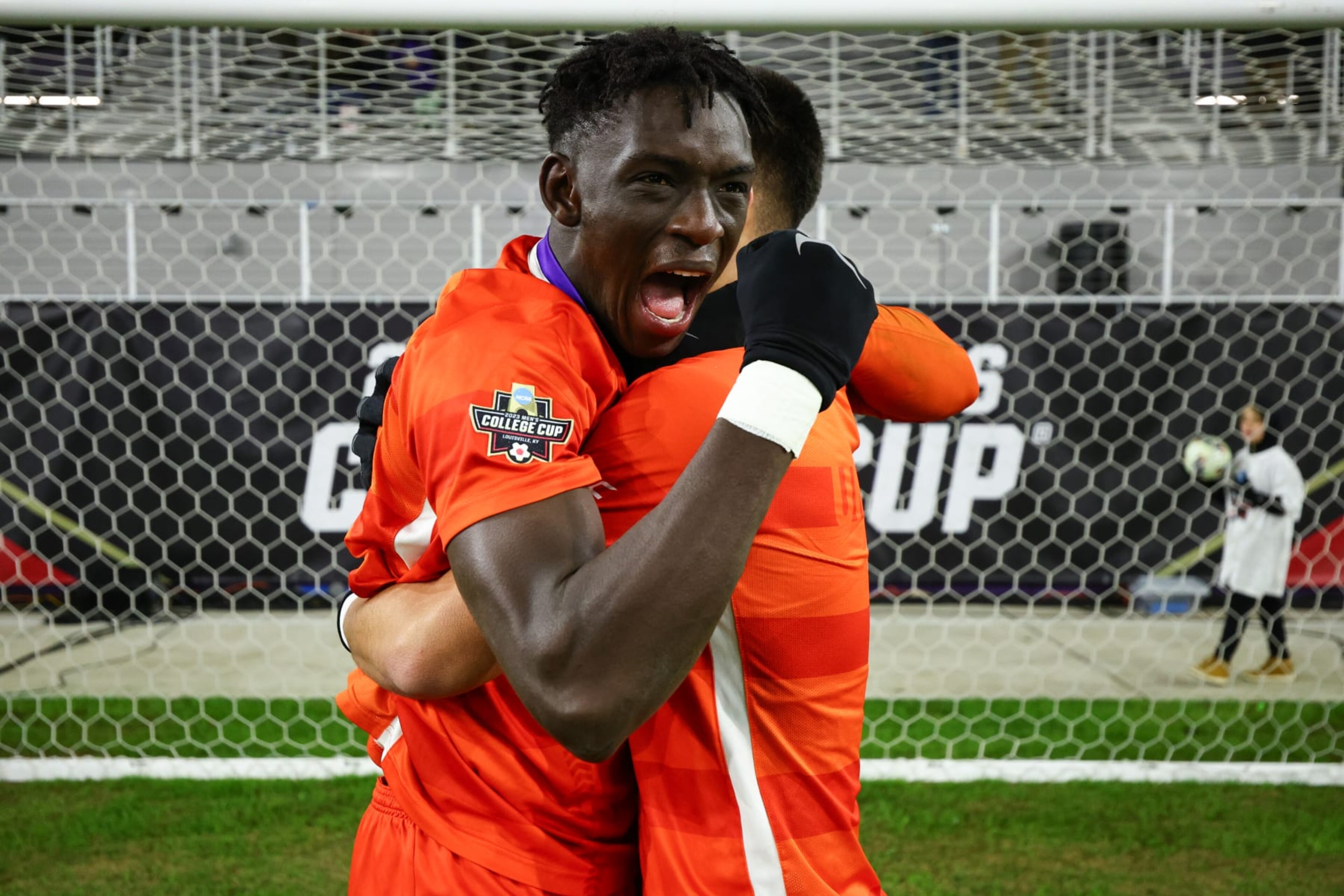 LOUISVILLE, KENTUCKY - DECEMBER 11: Pape Mar Boye #2 and Mason Jimenez #16 of the Clemson Tigers celebrates after beating the Notre Dame Fighting Irish for the Division I Men's Soccer Championship held at the Lynn Family Stadium on December 11, 2023 in Louisville, Kentucky. (Photo by Jamie Schwaberow/NCAA Photos via Getty Images) LOUISVILLE, KENTUCKY - DECEMBER 11: Pape Mar Boye #2 and Mason Jimenez #16 of the Clemson Tigers celebrates after beating the Notre Dame Fighting Irish for the Division I Men's Soccer Championship held at the Lynn Family Stadium on December 11, 2023 in Louisville, Kentucky. (Photo by Jamie Schwaberow/NCAA Photos via Getty Images)