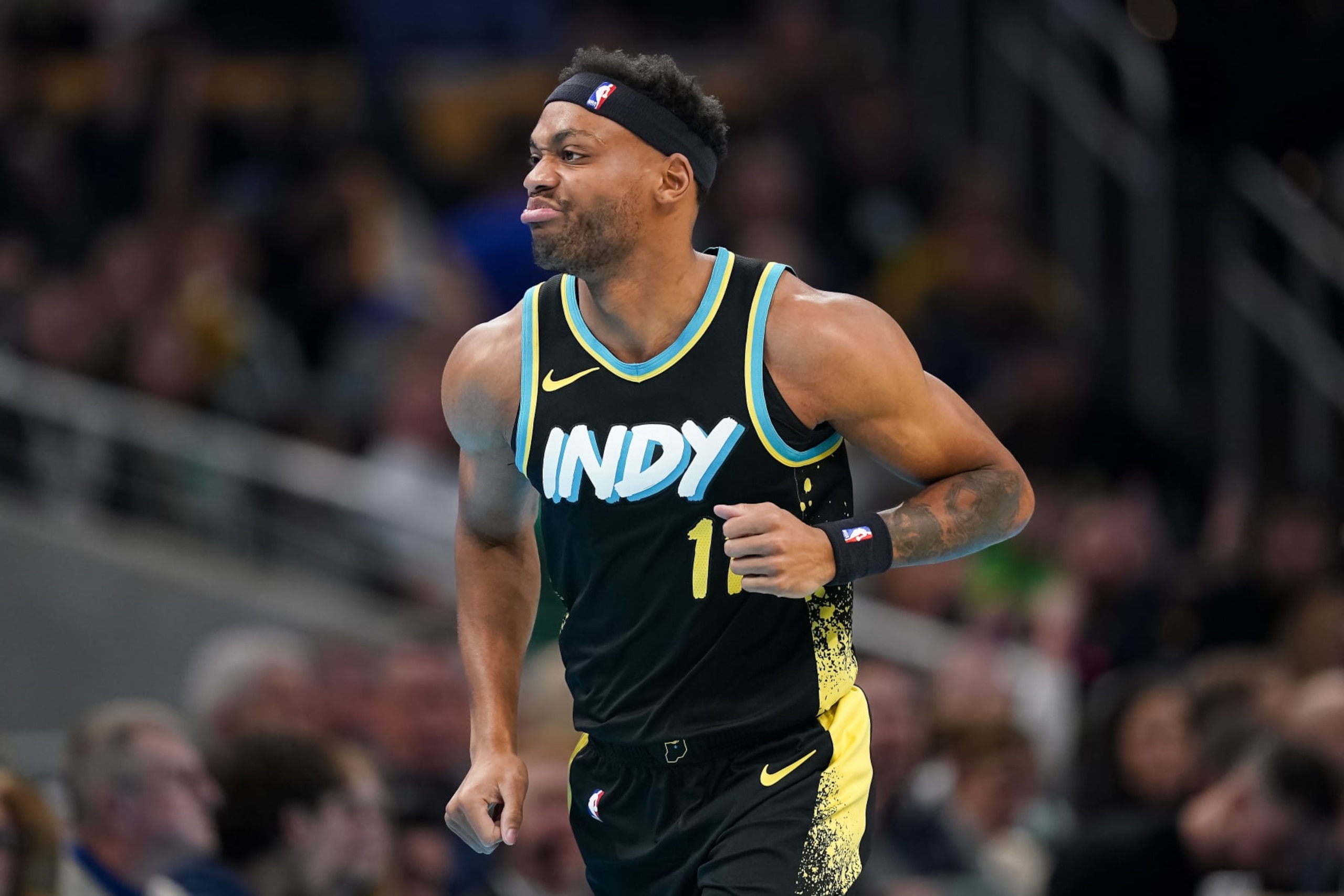 INDIANAPOLIS, INDIANA - DECEMBER 04: Bruce Brown #11 of the Indiana Pacers celebrates after making a shot in the first quarter against the Boston Celtics during the NBA In-Season Tournament at Gainbridge Fieldhouse on December 04, 2023 in Indianapolis, Indiana. NOTE TO USER: User expressly acknowledges and agrees that, by downloading and or using this photograph, User is consenting to the terms and conditions of the Getty Images License Agreement. (Photo by Dylan Buell/Getty Images)