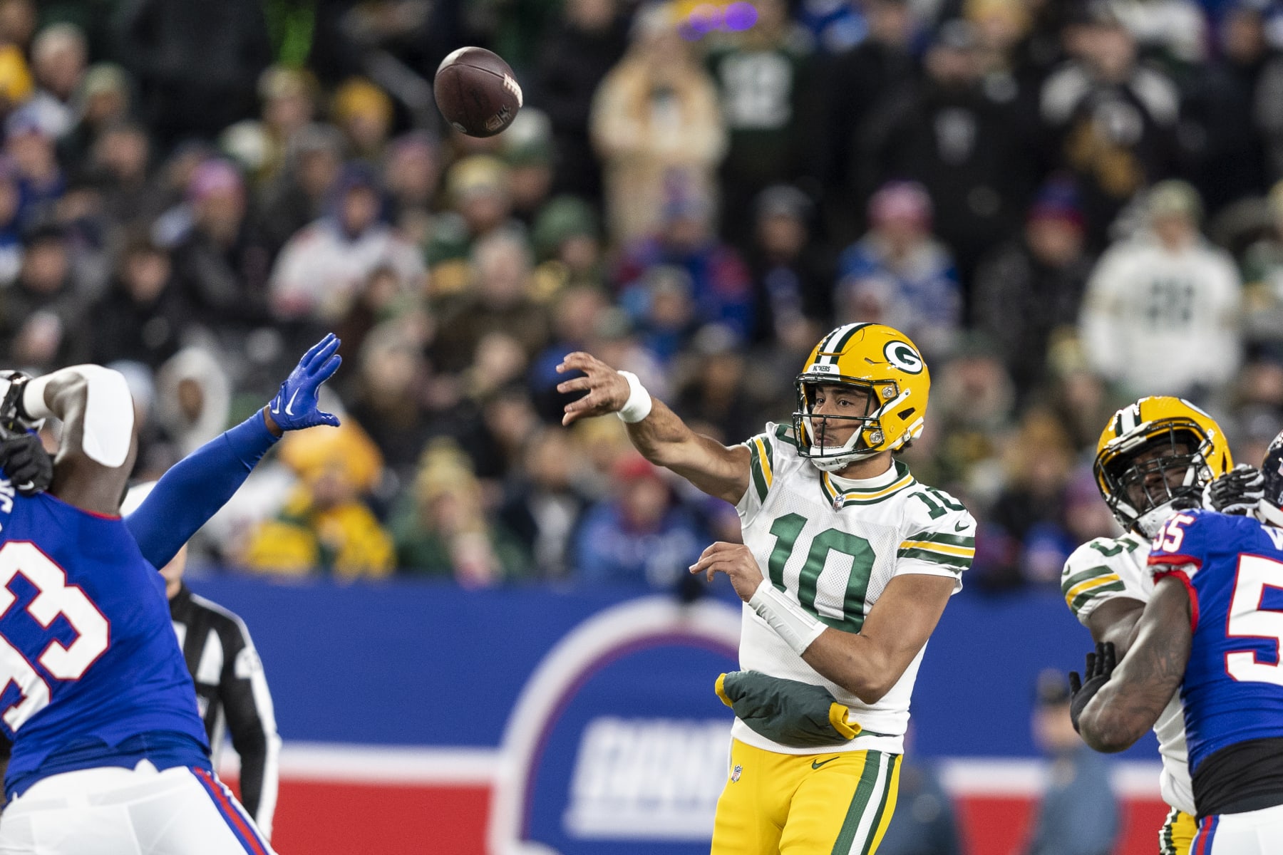 EAST RUTHERFORD, NEW JERSEY - DECEMBER 11: Jordan Love #10 of the Green Bay Packers throws a pass during an NFL football game between the New York Giants and the Green Bay Packers at MetLife Stadium on December 11, 2023 in East Rutherford, New Jersey. (Photo by Michael Owens/Getty Images)