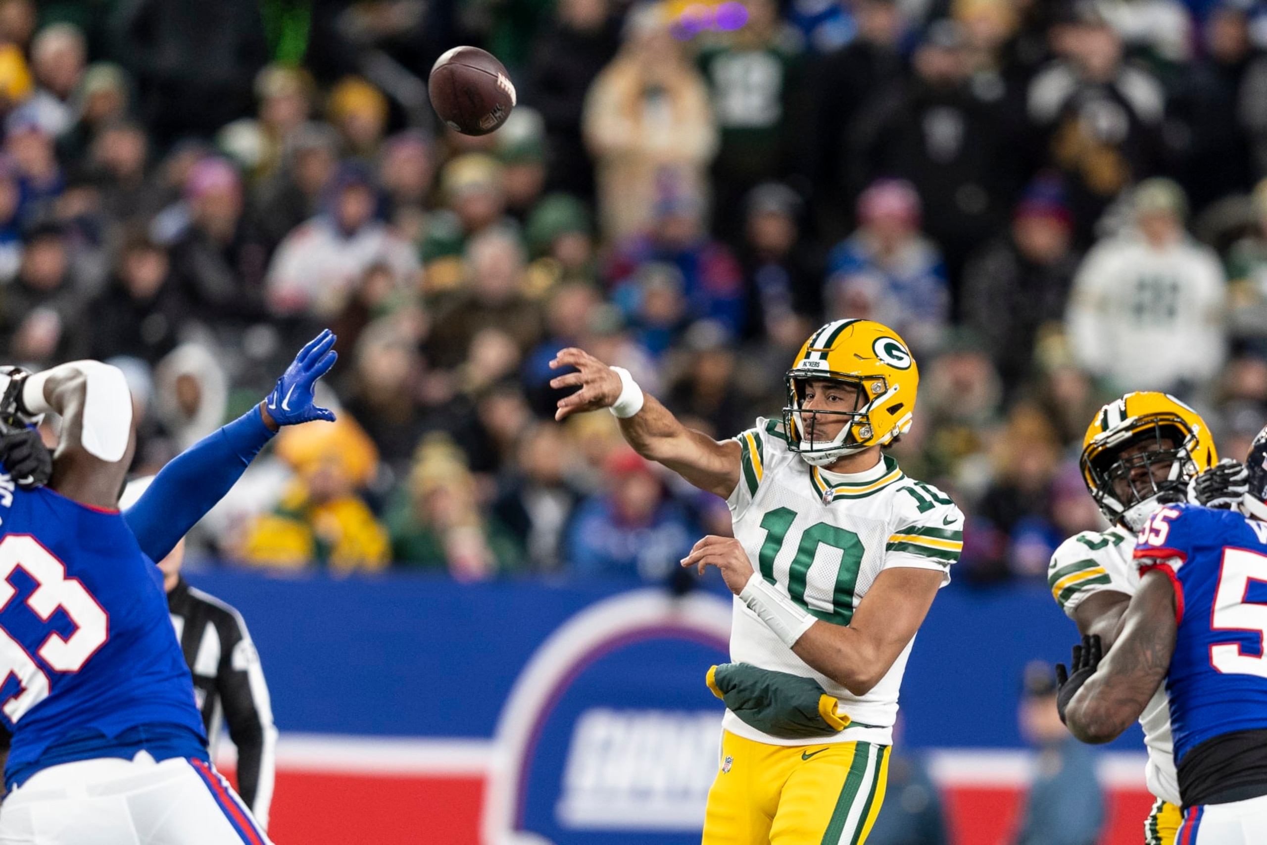 EAST RUTHERFORD, NEW JERSEY - DECEMBER 11: Jordan Love #10 of the Green Bay Packers throws a pass during an NFL football game between the New York Giants and the Green Bay Packers at MetLife Stadium on December 11, 2023 in East Rutherford, New Jersey. (Photo by Michael Owens/Getty Images)