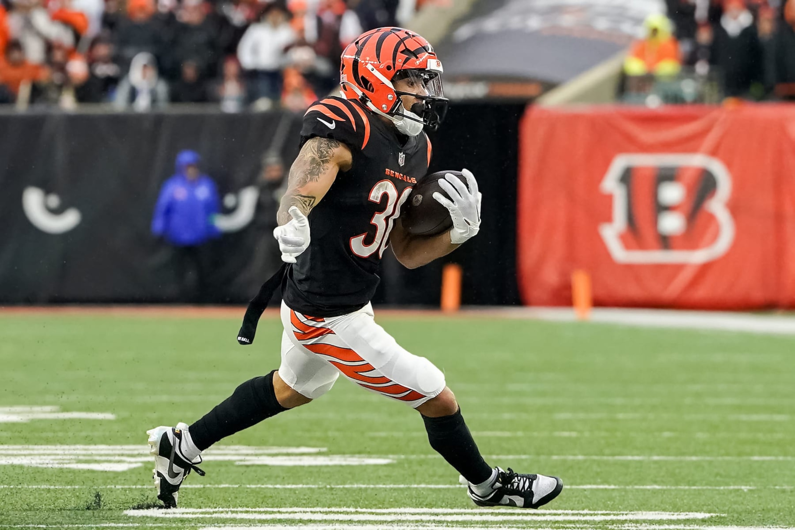 CINCINNATI, OHIO - DECEMBER 10: Chase Brown #30 of the Cincinnati Bengals runs with the ball in the fourth quarter against the Indianapolis Colts at Paycor Stadium on December 10, 2023 in Cincinnati, Ohio. (Photo by Dylan Buell/Getty Images)