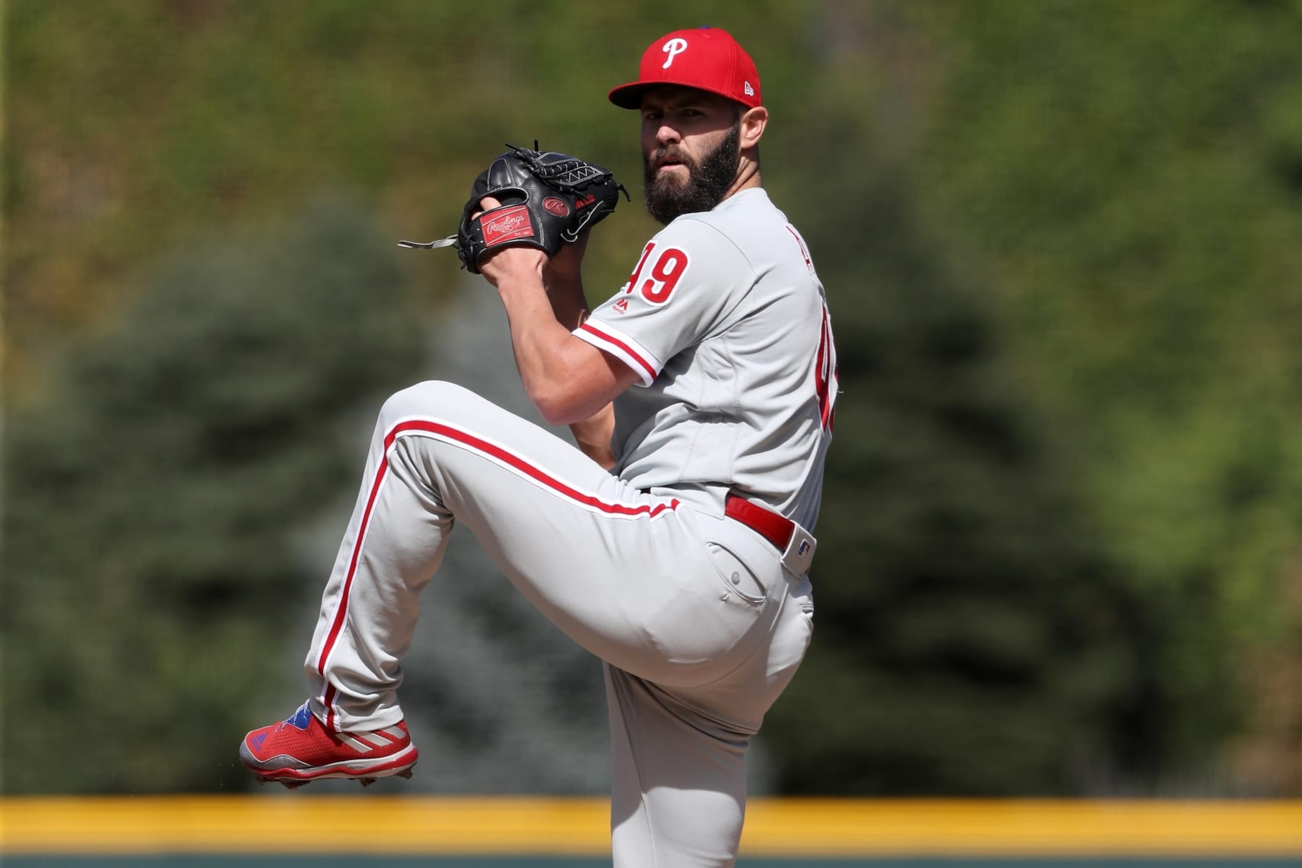 DENVER, CO - SEPTEMBER 27:  Starting pitcher Jake Arrieta #49 of the Philadelphia Phillies throws in the first inning against the Colorado Rockies at Coors Field on September 27, 2018 in Denver, Colorado.  (Photo by Matthew Stockman/Getty Images)