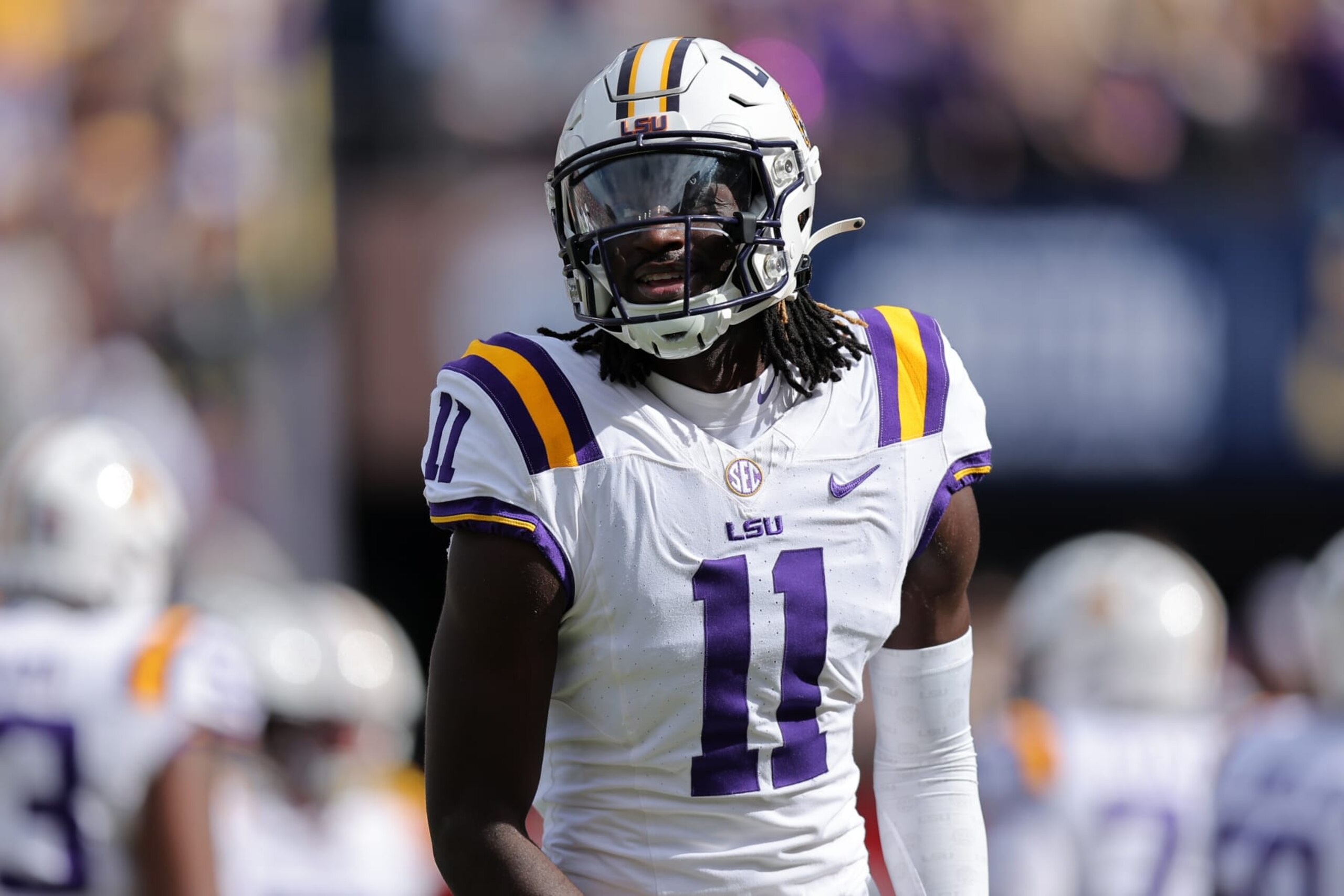 BATON ROUGE, LOUISIANA - NOVEMBER 25: Brian Thomas Jr. #11 of the LSU Tigers reacts against the Texas A&M Aggies during a game at Tiger Stadium on November 25, 2023 in Baton Rouge, Louisiana. (Photo by Jonathan Bachman/Getty Images)