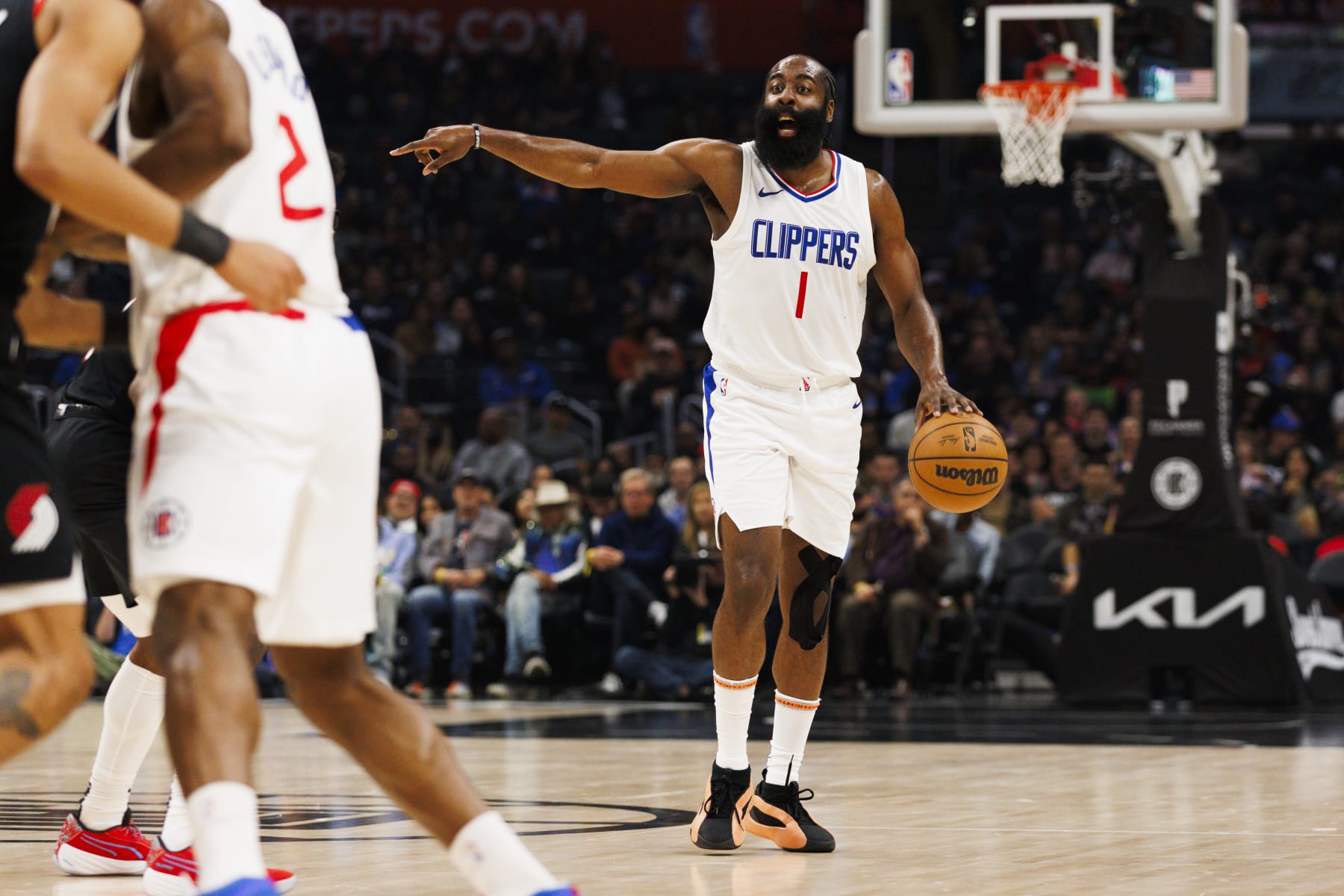 LOS ANGELES, CA - DECEMBER 11: LA Clippers guard James Harden (1) signals during an NBA basketball game against the Portland Trail Blazers on December 11, 2023 at Crypto.com Arena in Los Angeles, CA. (Photo by Ric Tapia/Icon Sportswire via Getty Images)