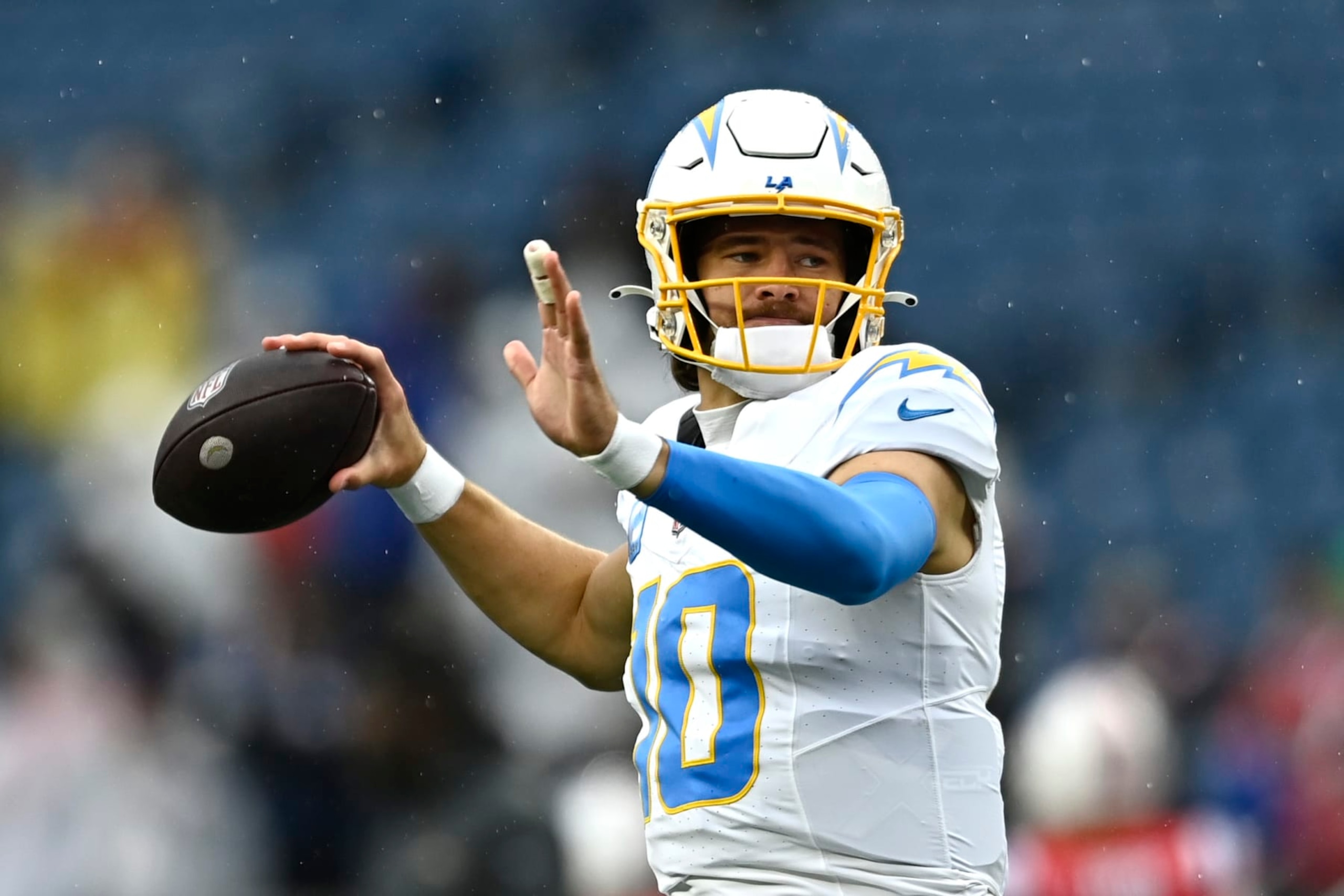 FOXBOROUGH, MASSACHUSETTS - DECEMBER 03: Justin Herbert #10 of the Los Angeles Chargers warms up before the game against the New England Patriots at Gillette Stadium on December 03, 2023 in Foxborough, Massachusetts. (Photo by Billie Weiss/Getty Images) FOXBOROUGH, MASSACHUSETTS - DECEMBER 03: Justin Herbert #10 of the Los Angeles Chargers warms up before the game against the New England Patriots at Gillette Stadium on December 03, 2023 in Foxborough, Massachusetts. (Photo by Billie Weiss/Getty Images)