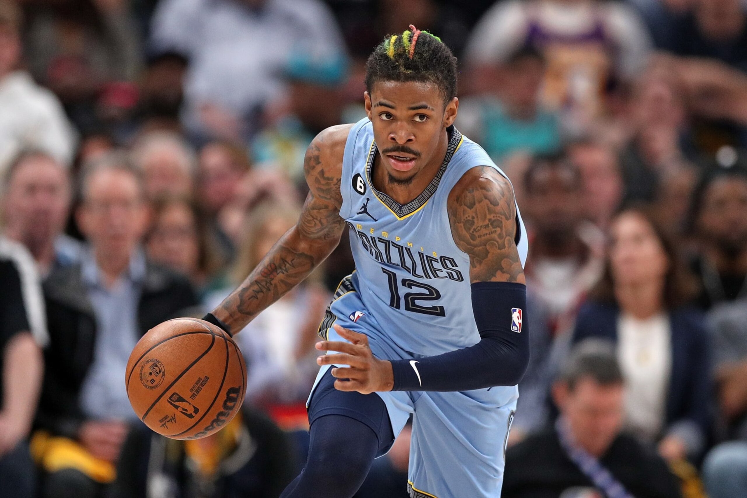 MEMPHIS, TENNESSEE - APRIL 26: Ja Morant #12 of the Memphis Grizzlies brings the ball upcourt against the Los Angeles Lakers during Game Five of the Western Conference First Round Playoffs at FedExForum on April 26, 2023 in Memphis, Tennessee. NOTE TO USER: User expressly acknowledges and agrees that, by downloading and or using this photograph, User is consenting to the terms and conditions of the Getty Images License Agreement. (Photo by Justin Ford/Getty Images) MEMPHIS, TENNESSEE - APRIL 26: Ja Morant #12 of the Memphis Grizzlies brings the ball upcourt against the Los Angeles Lakers during Game Five of the Western Conference First Round Playoffs at FedExForum on April 26, 2023 in Memphis, Tennessee. NOTE TO USER: User expressly acknowledges and agrees that, by downloading and or using this photograph, User is consenting to the terms and conditions of the Getty Images License Agreement. (Photo by Justin Ford/Getty Images)