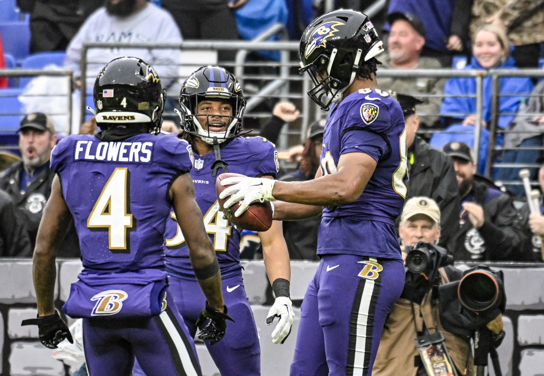 BALTIMORE, MD - DECEMBER 10:  Baltimore Ravens tight end Isaiah Likely (80) celebrates his touchdown reception with running back Keaton Mitchell (34) during the Los Angeles Rams game versus the Baltimore Ravens on December 10, 2023 at M&T Bank Stadium in Baltimore, MD.  (Photo by Mark Goldman/Icon Sportswire via Getty Images)